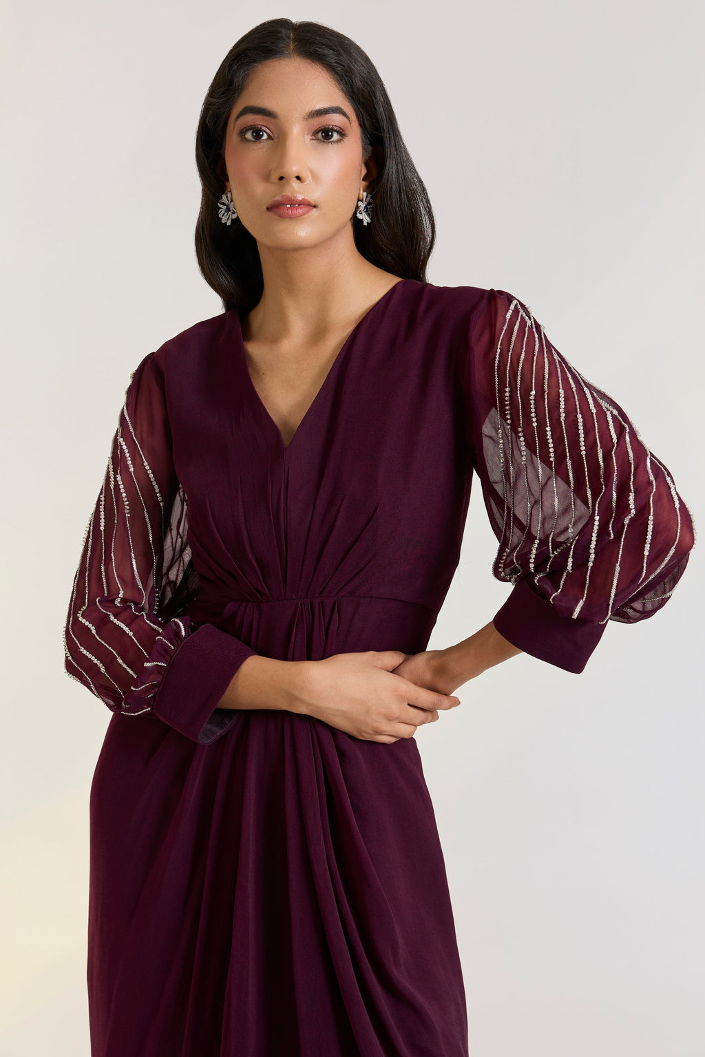 Georgette Orla Dress at Kamakhyaa by Ewoke. This item is destination wedding outfits, draped gowns, festive, Georgette, Missing image, Nostalgia's Thread by Ewoke, sustainable fashion, wedding dress, Wedding wear, Wine, wine gown