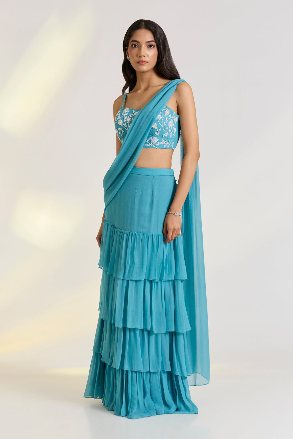 Georgette Teal Embroidered Pre-Drape Saree at Kamakhyaa by Ewoke. This item is Bemberg, bemberg fabric, destination wedding lehengas, draped saree, embroidered lehengas, Georgette, Lehenga set, Nostalgia's Thread by Ewoke, Steal Blue, sustainable fashion