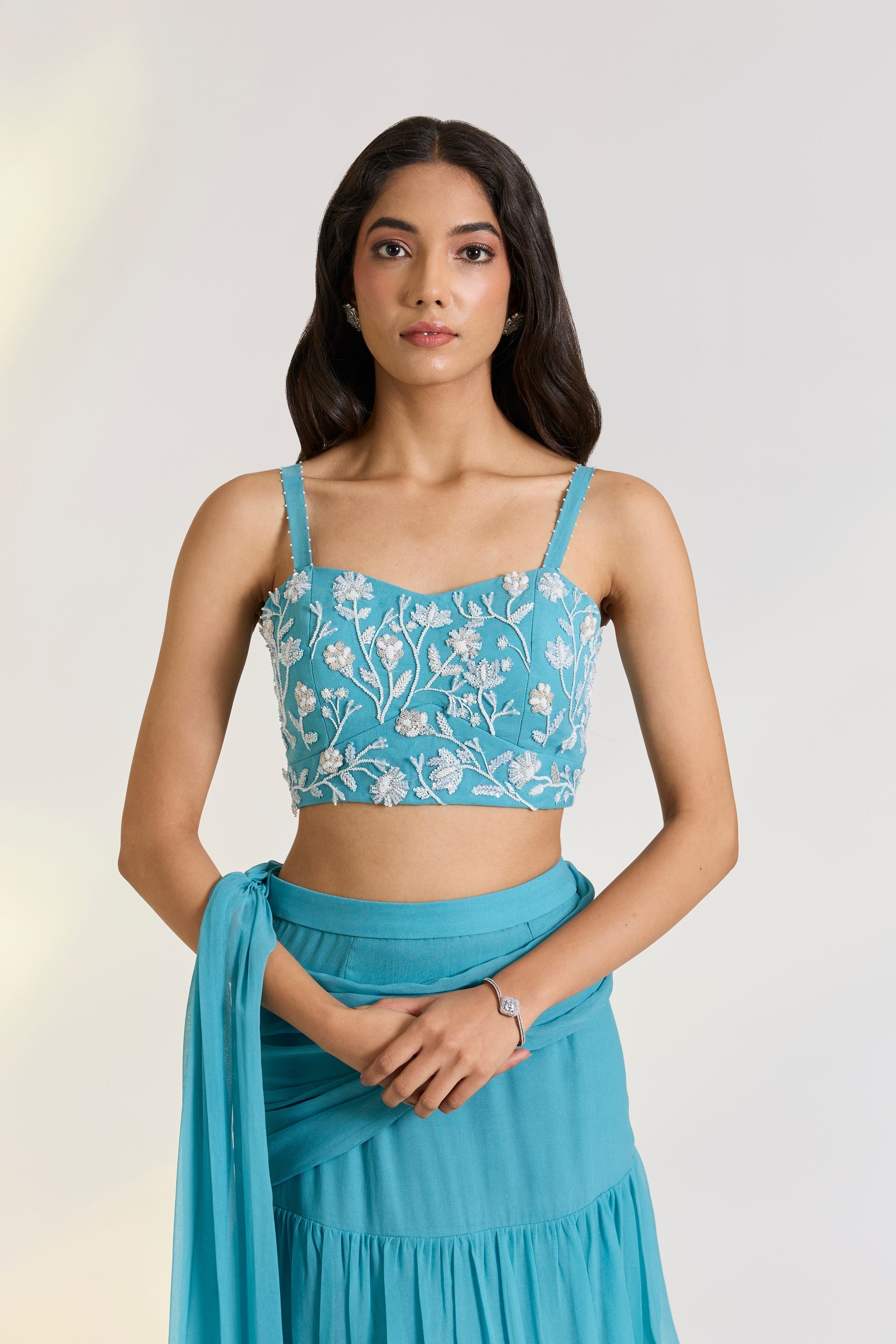 Georgette Teal Embroidered Pre-Drape Saree at Kamakhyaa by Ewoke. This item is Bemberg, bemberg fabric, destination wedding lehengas, draped saree, embroidered lehengas, Georgette, Lehenga set, Nostalgia's Thread by Ewoke, Steal Blue, sustainable fashion