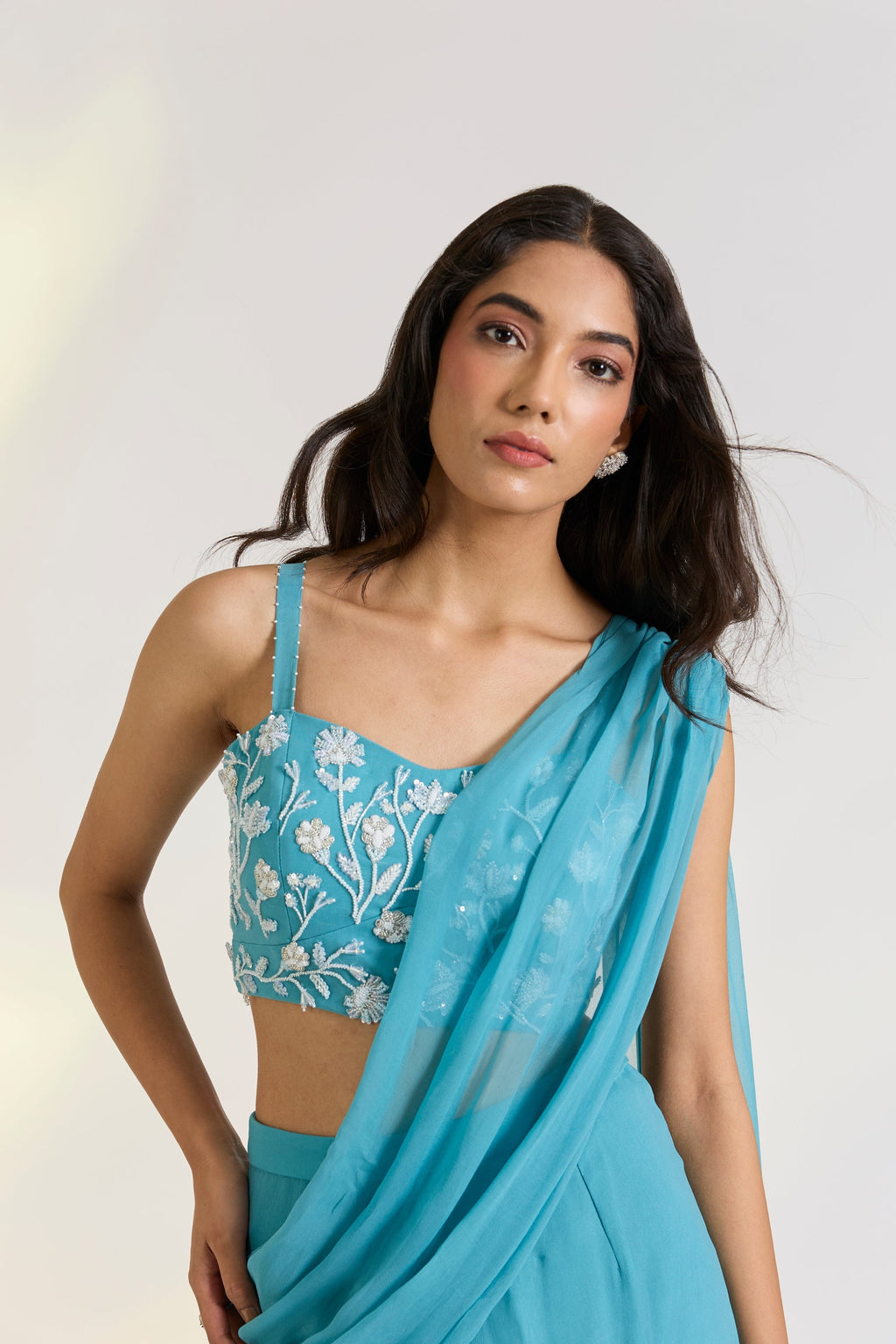 Georgette Teal Embroidered Pre-Drape Saree at Kamakhyaa by Ewoke. This item is Bemberg, bemberg fabric, destination wedding lehengas, draped saree, embroidered lehengas, Georgette, Lehenga set, Nostalgia's Thread by Ewoke, Steal Blue, sustainable fashion