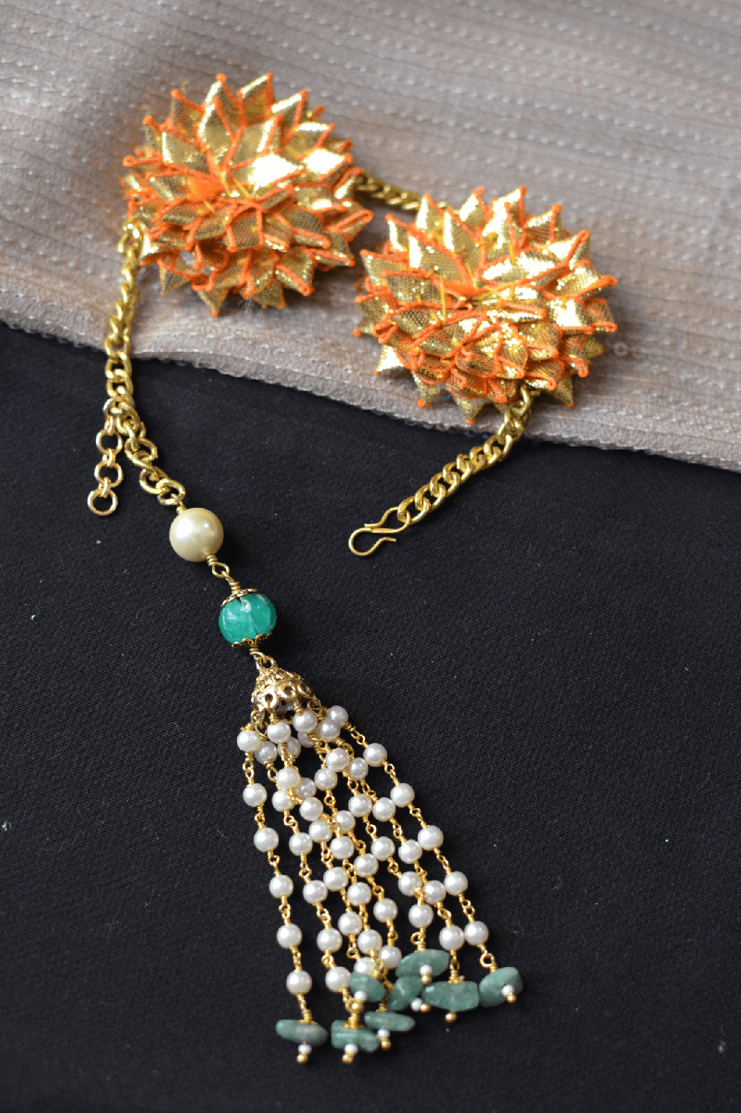 Gold Bracelet Gota Tassel at Kamakhyaa by House Of Heer. This item is Add Ons, Alloy Metal, Bracelets, Festive Jewellery, Festive Wear, Free Size, Gemstone, Gold, jewelry, July Sale, July Sale 2023, Less than $50, Natural, Pearl, Textured