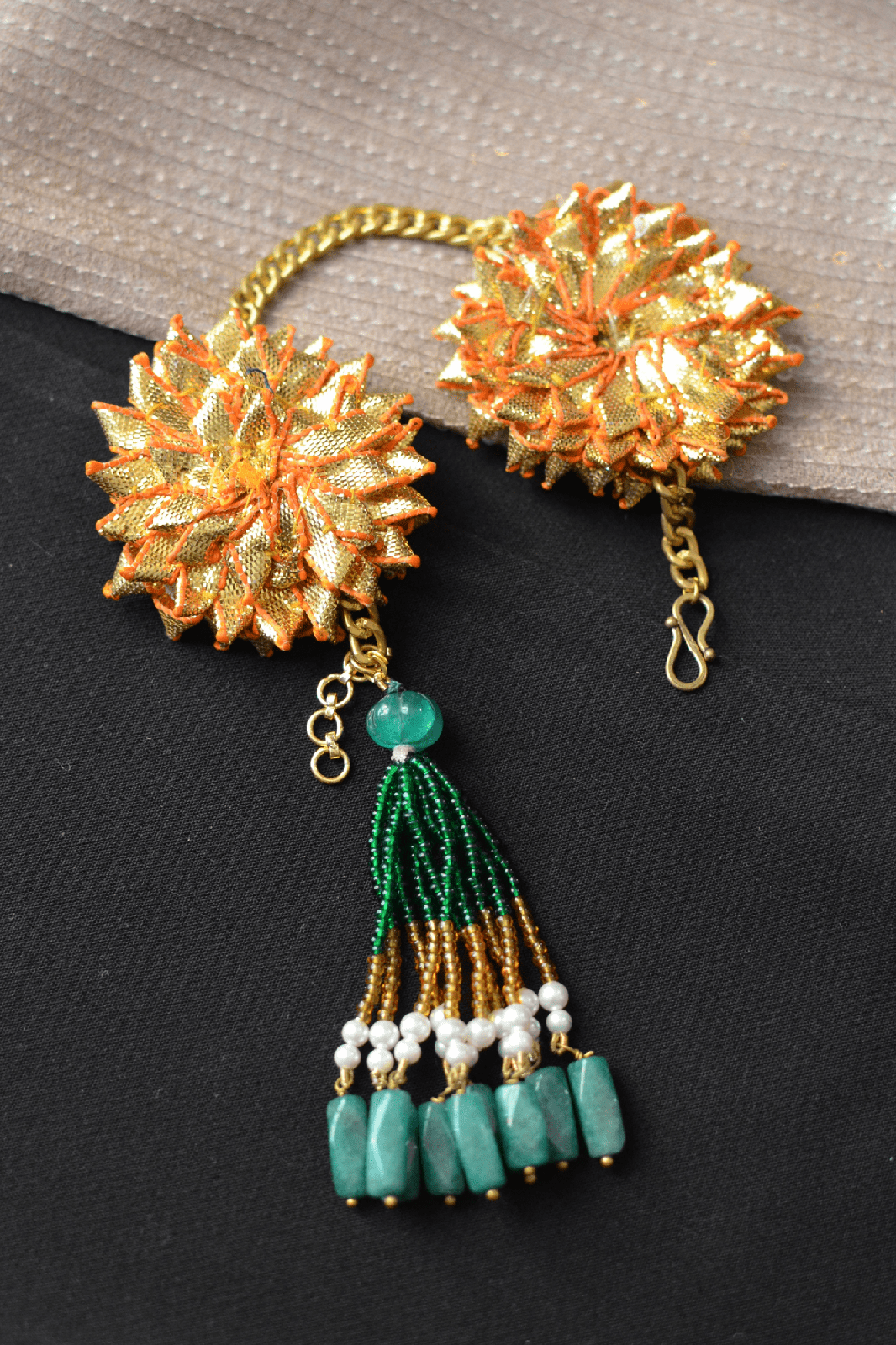 Gold Bracelet Gota Tassel at Kamakhyaa by House Of Heer. This item is Add Ons, Alloy Metal, Bracelets, Festive Jewellery, Festive Wear, Free Size, Gemstone, Gold, jewelry, July Sale, July Sale 2023, Less than $50, Natural, Pearl, Textured