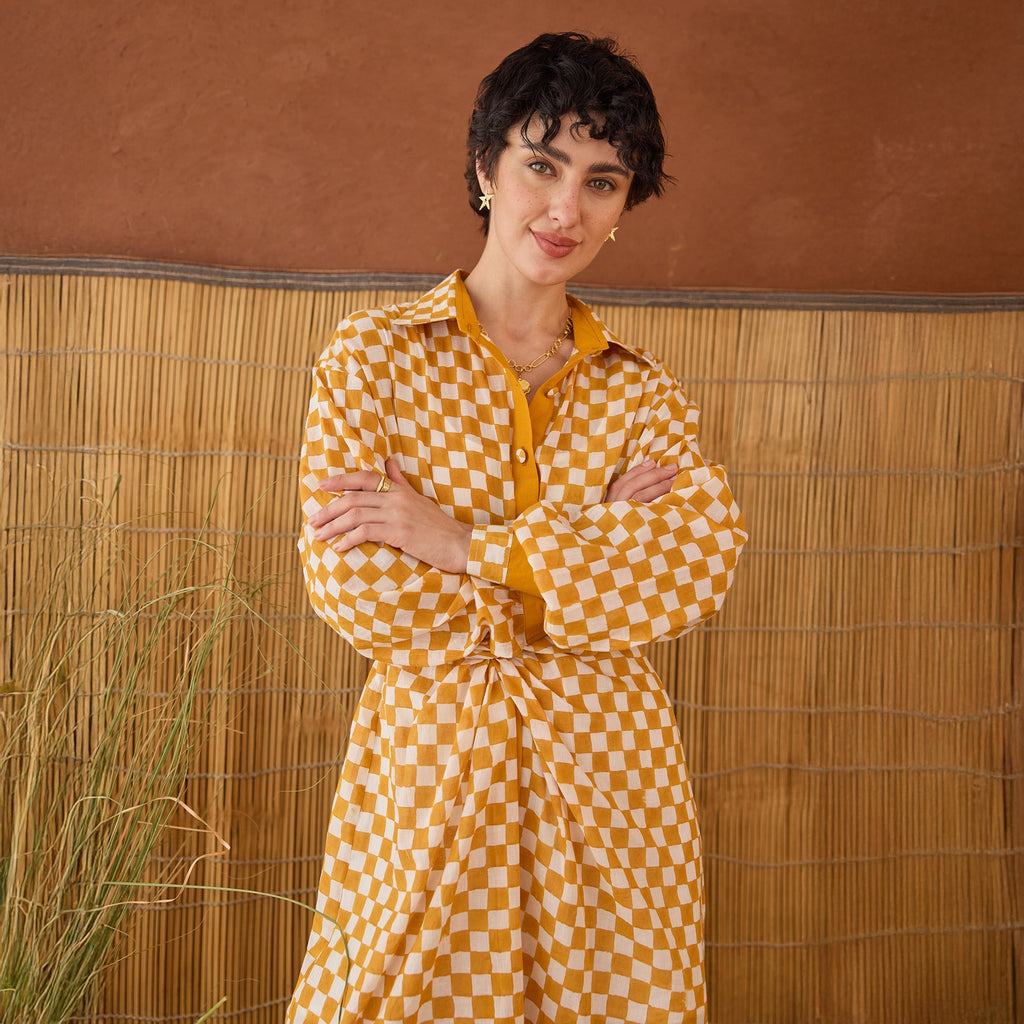 Golden Hour Gingham at Kamakhyaa by Taro. This item is Artisan made, Cotton Mulmul, Handblock Printed, Mustard, Orange, Shirt Dresses, Under $200, Whispers of Summer by Taro, Yellow