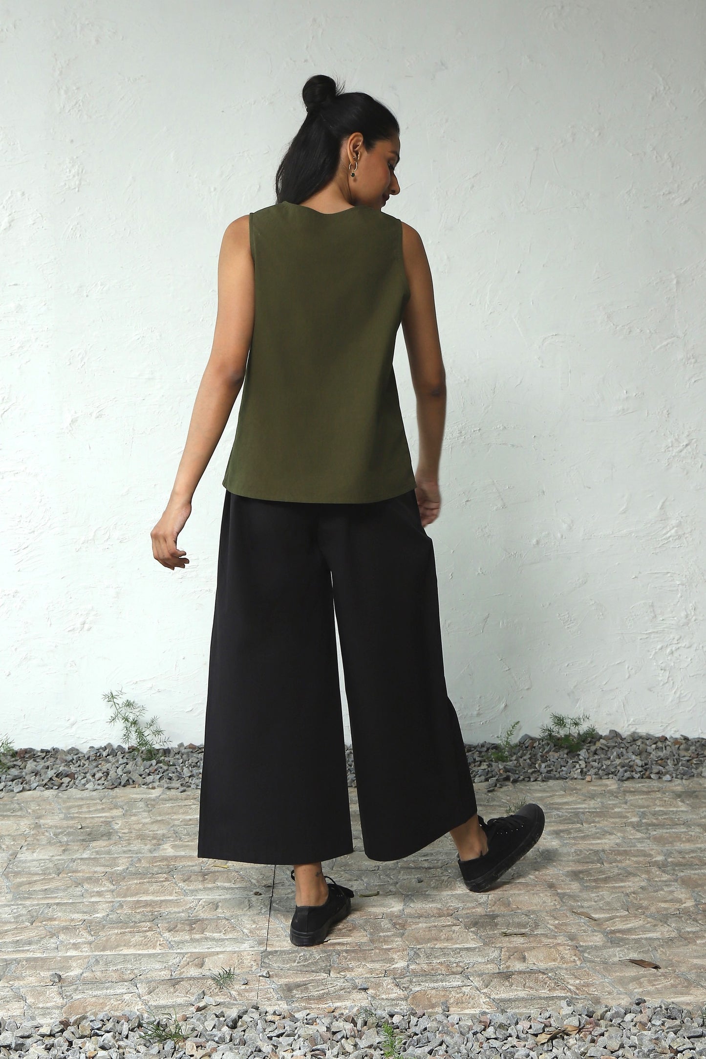 Green Cotton Poplin Sleeveless Top With Black Bottom Co-Ord Set at Kamakhyaa by Canoopi. This item is Black, Canoopi, Casual Wear, Complete Sets, Green, Natural, Poplin, Regular Fit, Solids, Vacation Co-ords, Womenswear