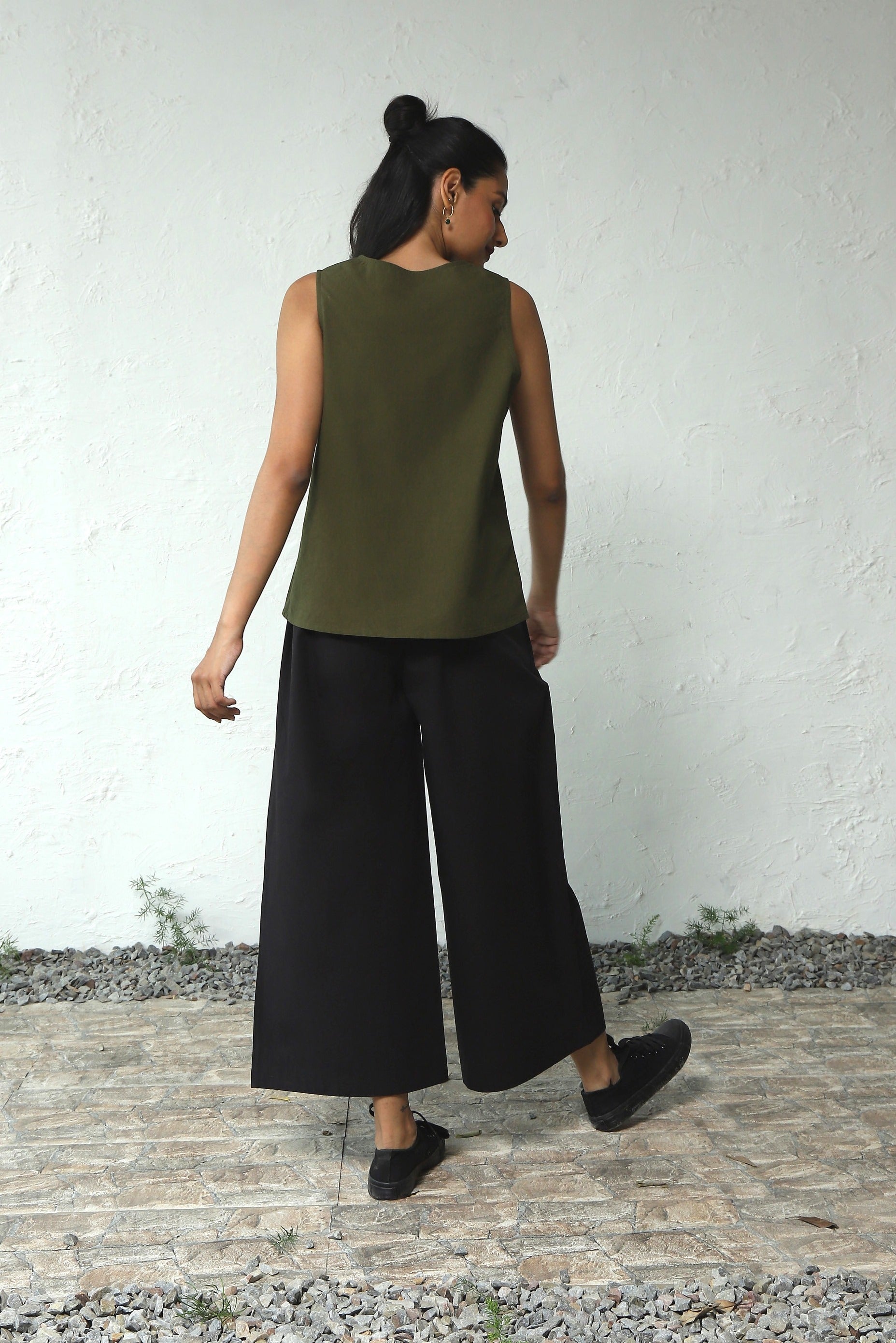 Green Cotton Poplin Sleeveless Top With Black Bottom Co-Ord Set at Kamakhyaa by Canoopi. This item is Black, Canoopi, Casual Wear, Complete Sets, Green, Natural, Poplin, Regular Fit, Solids, Vacation Co-ords, Womenswear