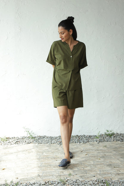 Green Cotton Shirt With Box Pleate Short Set at Kamakhyaa by Canoopi. This item is Canoopi, Casual Wear, Complete Sets, Green, Natural, Poplin, Regular Fit, Solids, Vacation Co-ords, Womenswear