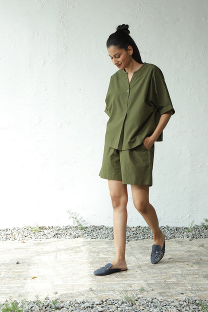 Green Cotton Shirt With Box Pleate Short Set at Kamakhyaa by Canoopi. This item is Canoopi, Casual Wear, Complete Sets, Green, Natural, Poplin, Regular Fit, Solids, Vacation Co-ords, Womenswear