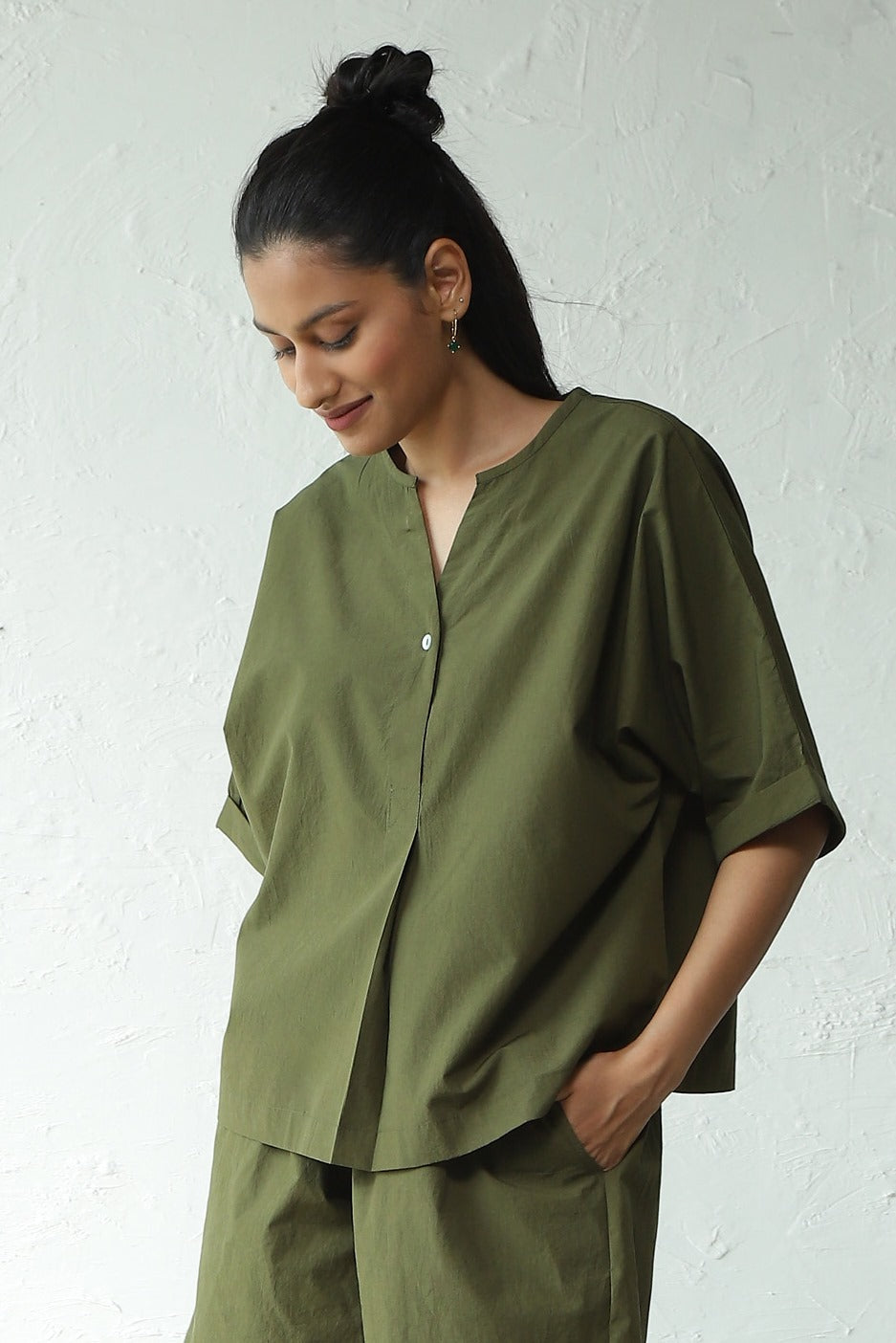 Green Cotton Shirt With Box Pleate Short Set at Kamakhyaa by Canoopi. This item is Canoopi, Casual Wear, Complete Sets, Green, Natural, Poplin, Regular Fit, Solids, Vacation Co-ords, Womenswear