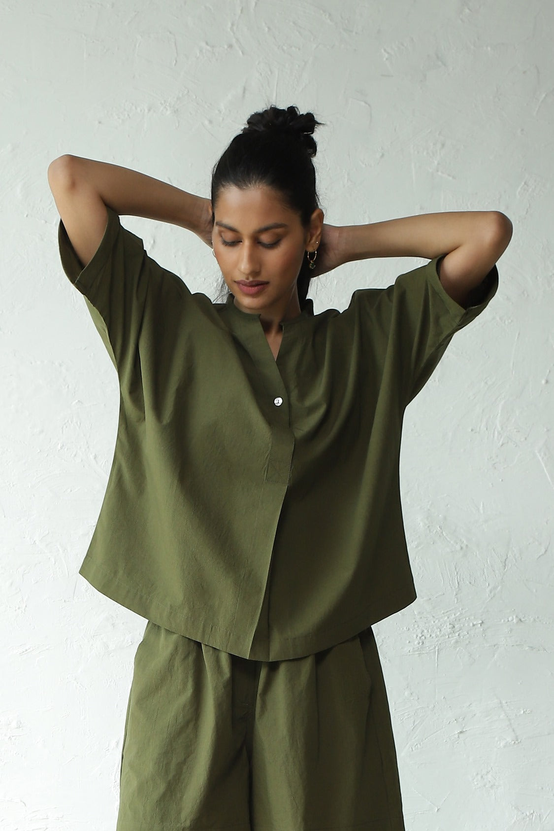 Green Cotton Shirt With Box Pleate Short Set at Kamakhyaa by Canoopi. This item is Canoopi, Casual Wear, Complete Sets, Green, Natural, Poplin, Regular Fit, Solids, Vacation Co-ords, Womenswear