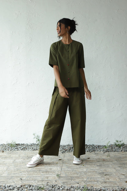 Green Cotton Top With Rayon Pant Set at Kamakhyaa by Canoopi. This item is Canoopi, Casual Wear, Complete Sets, Green, Natural, Poplin, Regular Fit, Solids, Vacation Co-ords, Womenswear