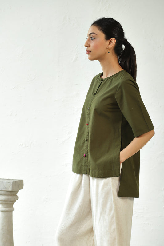 Green Cotton Top With White Rayon Pant Set at Kamakhyaa by Canoopi. This item is Canoopi, Casual Wear, Complete Sets, Green, Natural, Poplin, Rayon, Regular Fit, Solids, Vacation Co-ords, Womenswear