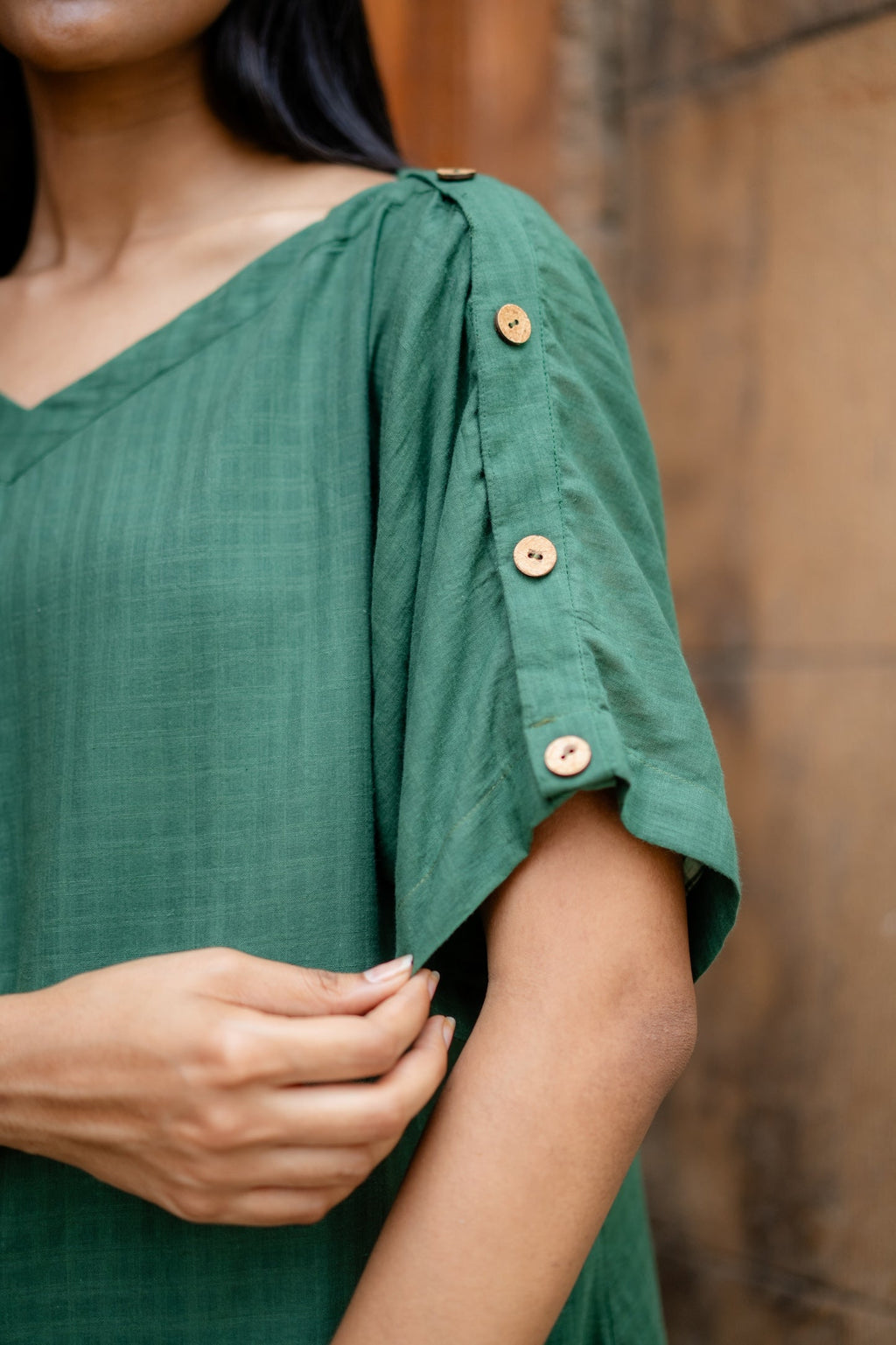 Green Hand-Embroidered A-Line Dress at Kamakhyaa by Krushnachuda. This item is Chilika by Krushnachuda, Embroidered, Green, Handloom Cotton, Loose Fit, Natural Dye, Organic, Outerwear, Under $200, Womenswear