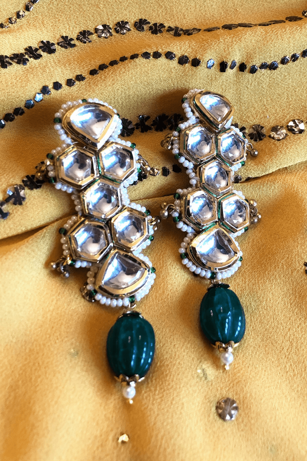 Green Long Earrings Kalika at Kamakhyaa by House Of Heer. This item is Alloy Metal, Festive Jewellery, Festive Wear, Free Size, Gemstone, Green, jewelry, July Sale, July Sale 2023, Long Earrings, Natural, Solids, Textured