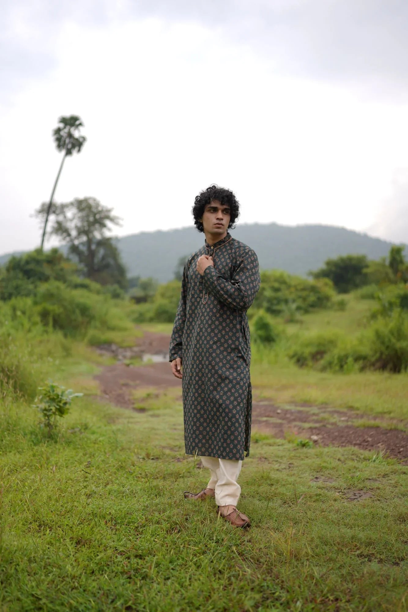 Green Small Butta Kurta for Men at Kamakhyaa by Hasttvam. This item is Cotton, Festive Wear, Floral, Green, Handmade by Artisans, Natural dyes, Relaxed Fit, Respondible production and Vegan