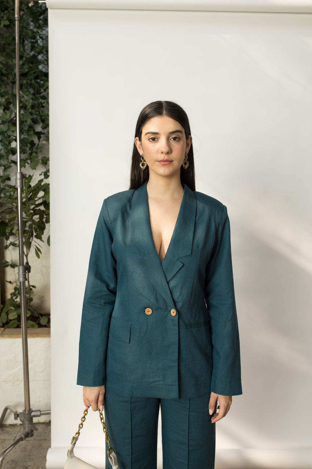 Green Solid Blazer with Buttons at kamakhyaa.com by Anushé Pirani. This item is Buttons, Cotton Hemp, Everyday Ethos, Green, Iconic Threads of Kate Middleton, Jackets, Nostalgic Whispers by Anushe Pirani, Office Chic, Office Formals, Office Wear, Review September 2025, Slim Fit, solid, Winter Products, Womenswear