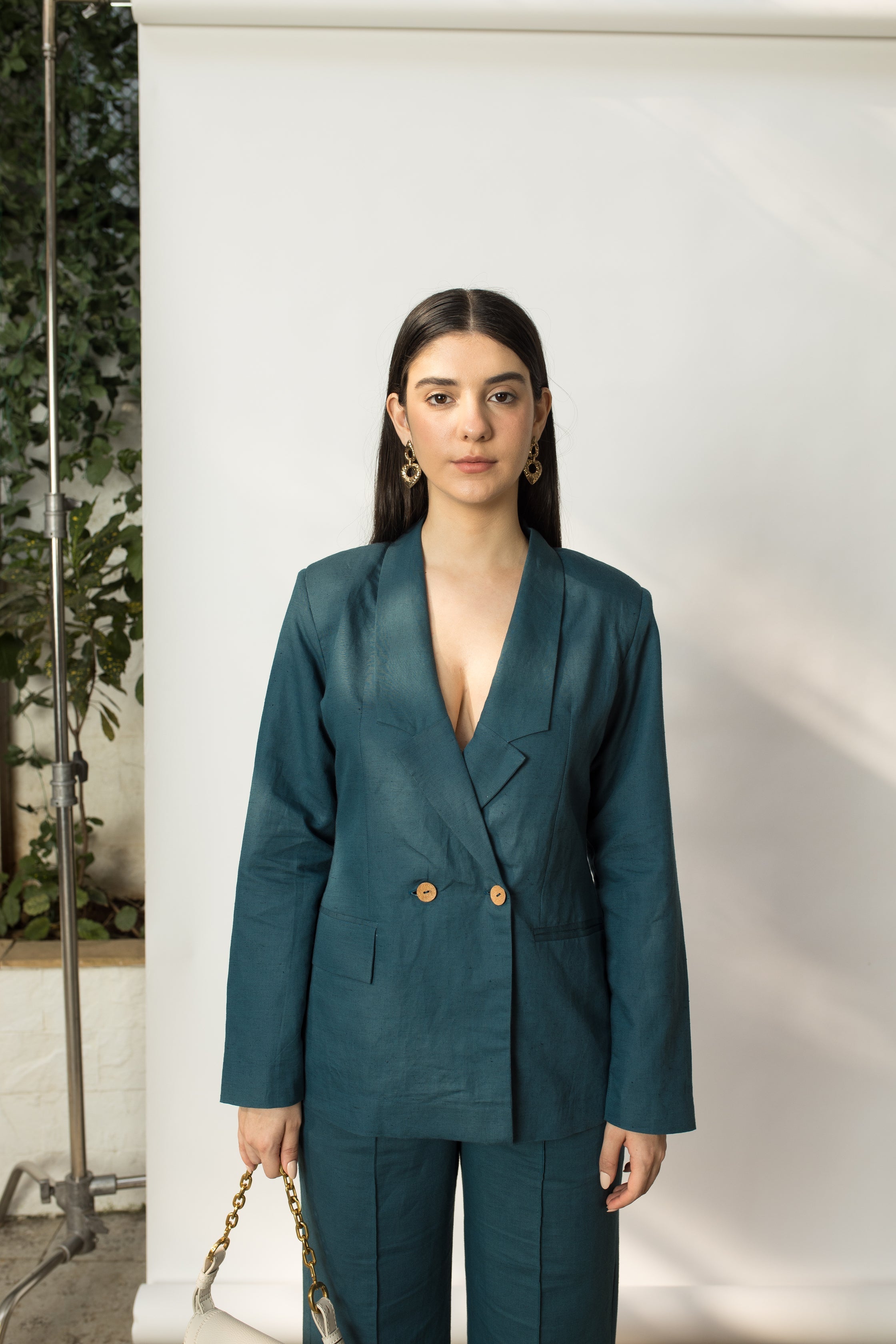 Green Solid Blazer with Buttons at kamakhyaa.com by Anushé Pirani. This item is Buttons, Cotton Hemp, Everyday Ethos, Green, Iconic Threads of Kate Middleton, Jackets, Nostalgic Whispers by Anushe Pirani, Office Chic, Office Formals, Office Wear, Review September 2025, Slim Fit, solid, Winter Products, Womenswear
