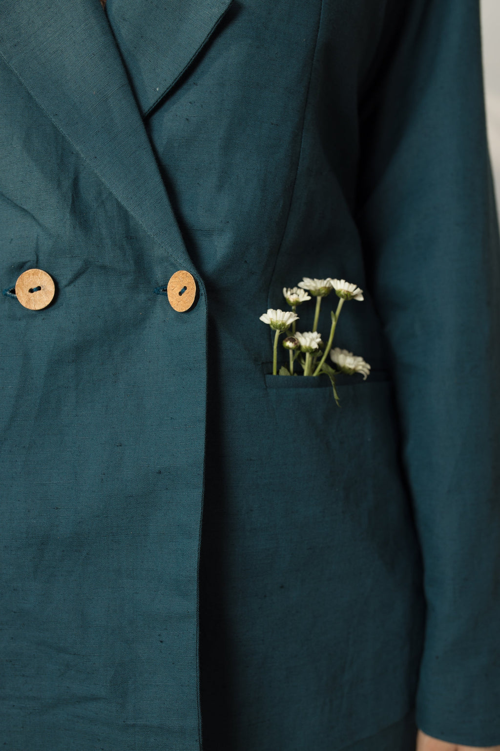Green Solid Blazer with Buttons at kamakhyaa.com by Anushé Pirani. This item is Buttons, Cotton Hemp, Everyday Ethos, Green, Iconic Threads of Kate Middleton, Jackets, Nostalgic Whispers by Anushe Pirani, Office Chic, Office Formals, Office Wear, Review September 2025, Slim Fit, solid, Winter Products, Womenswear