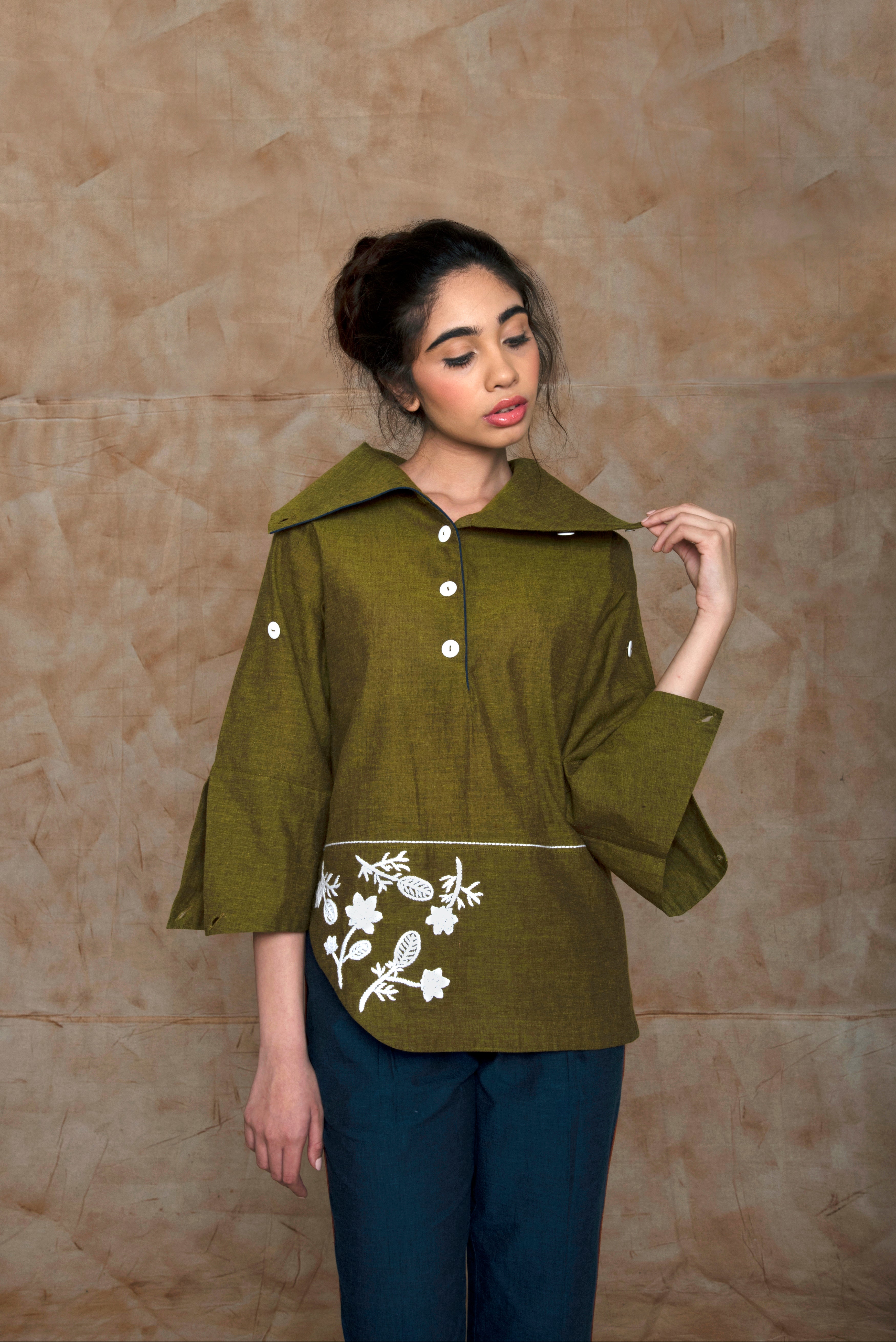 Green Tunic Top with Embroidery at kamakhyaa.com by Anushé Pirani. This item is Anushe Pirani Sale, Embroidered, Green, Handwoven Cotton, July Sale, July Sale 2023, Natural, Ocean of Stories, Ocean of Stories by Anushe Pirani, Office Wear, Regular Fit, Shirt, Shirts, Tops, Tunic Tops, Womenswear