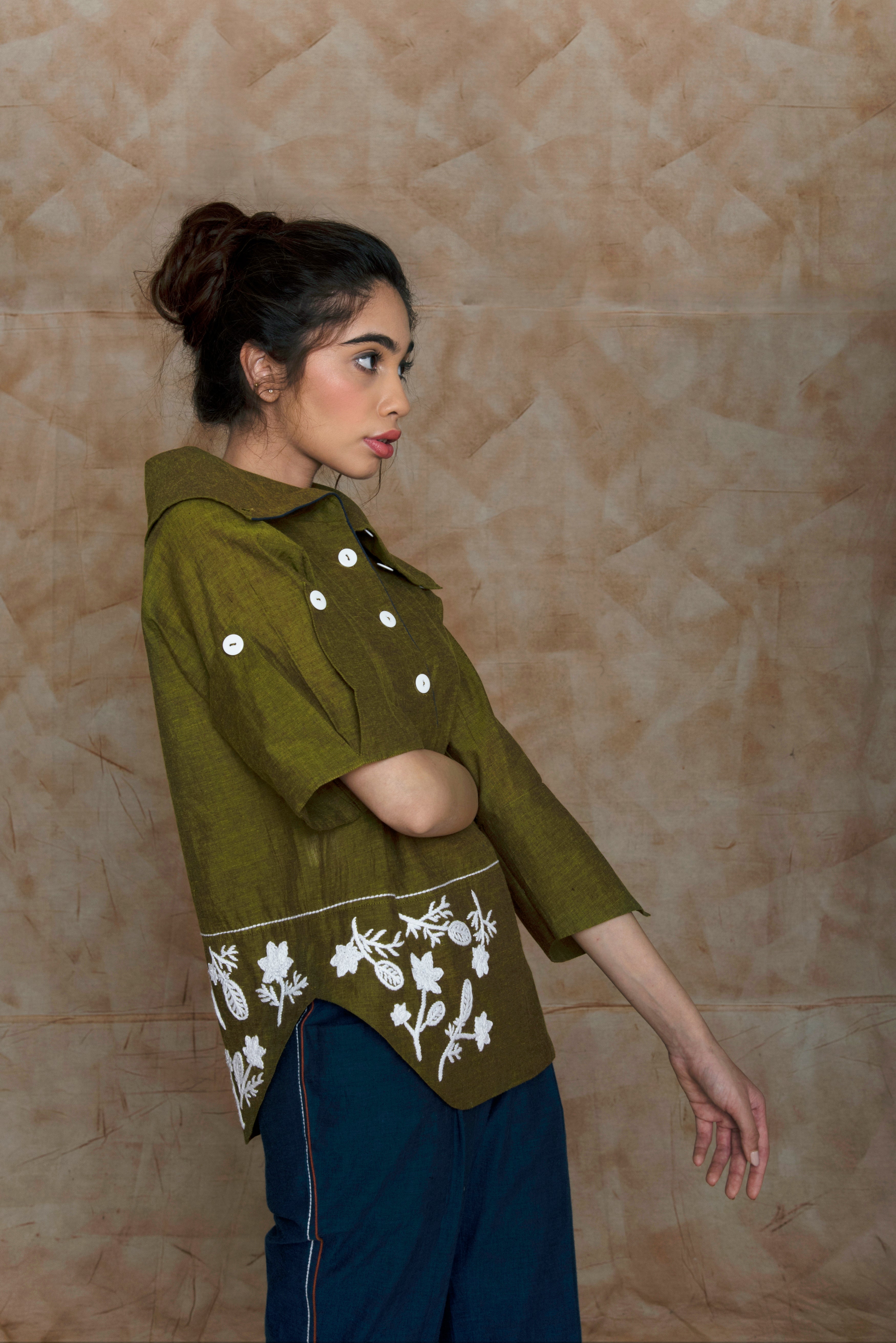 Green Tunic Top with Embroidery at kamakhyaa.com by Anushé Pirani. This item is Anushe Pirani Sale, Embroidered, Green, Handwoven Cotton, July Sale, July Sale 2023, Natural, Ocean of Stories, Ocean of Stories by Anushe Pirani, Office Wear, Regular Fit, Shirt, Shirts, Tops, Tunic Tops, Womenswear