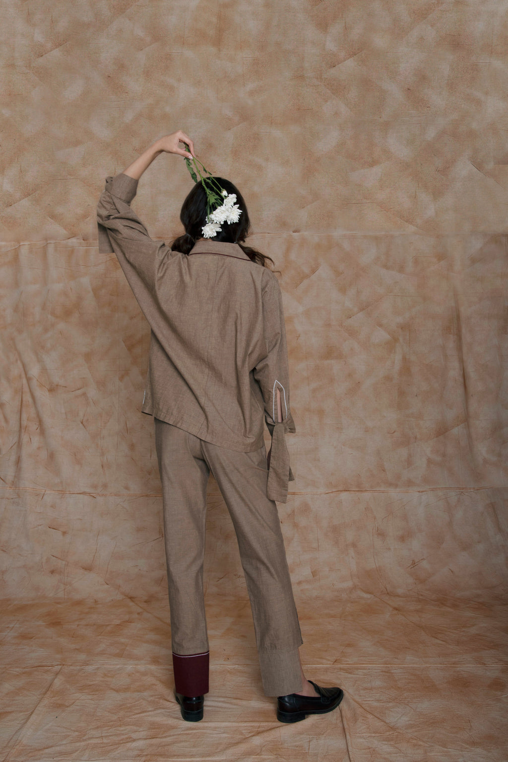 Grey Cuff Pants at kamakhyaa.com by Anushé Pirani. This item is Anushe Pirani Sale, Embroidered, Grey, Handwoven Cotton, July Sale, July Sale 2023, Natural, Ocean of Stories, Ocean of Stories by Anushe Pirani, Office Wear, Pants, Patchwork, Regular Fit, Womenswear