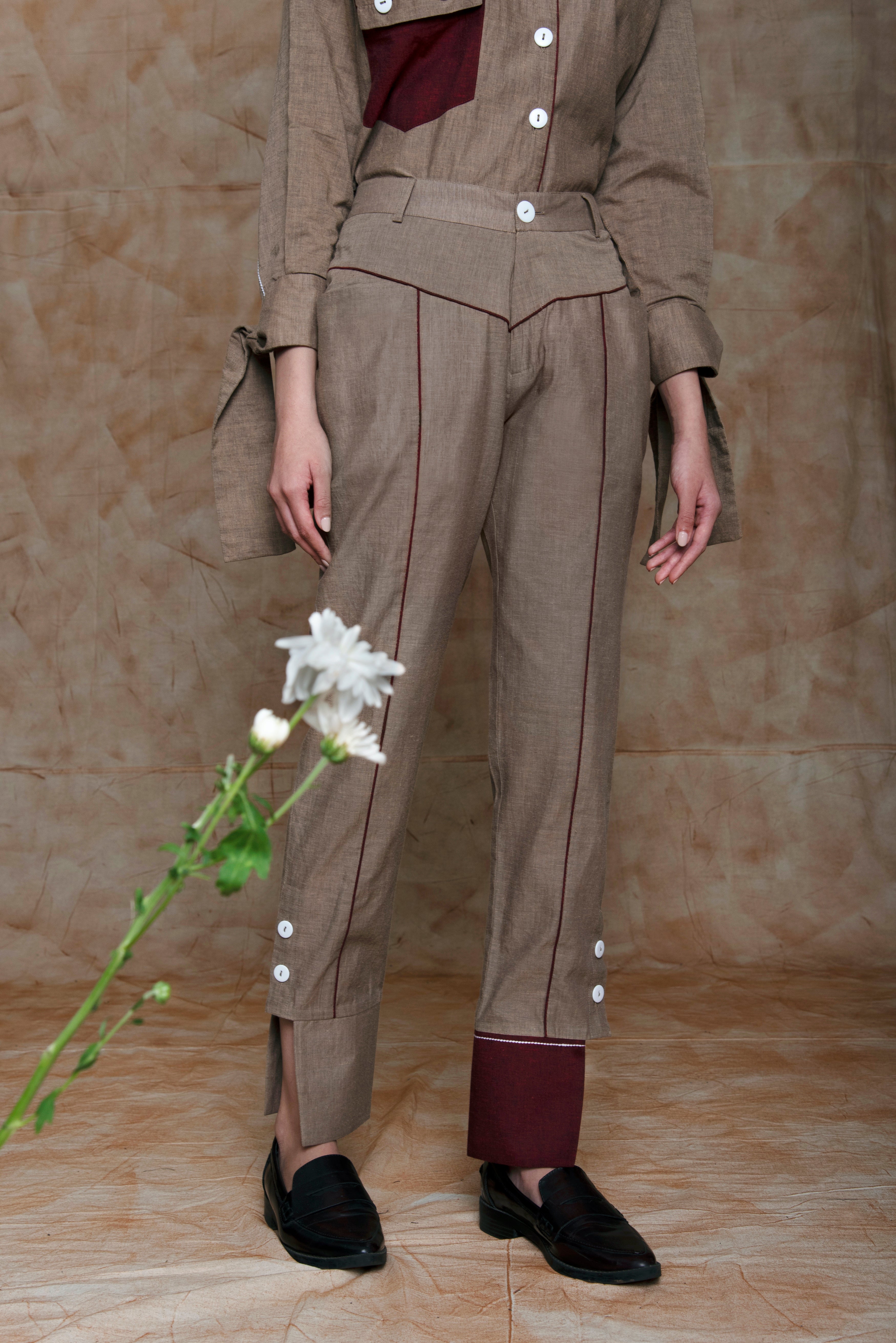 Grey Cuff Pants at kamakhyaa.com by Anushé Pirani. This item is Anushe Pirani Sale, Embroidered, Grey, Handwoven Cotton, July Sale, July Sale 2023, Natural, Ocean of Stories, Ocean of Stories by Anushe Pirani, Office Wear, Pants, Patchwork, Regular Fit, Womenswear