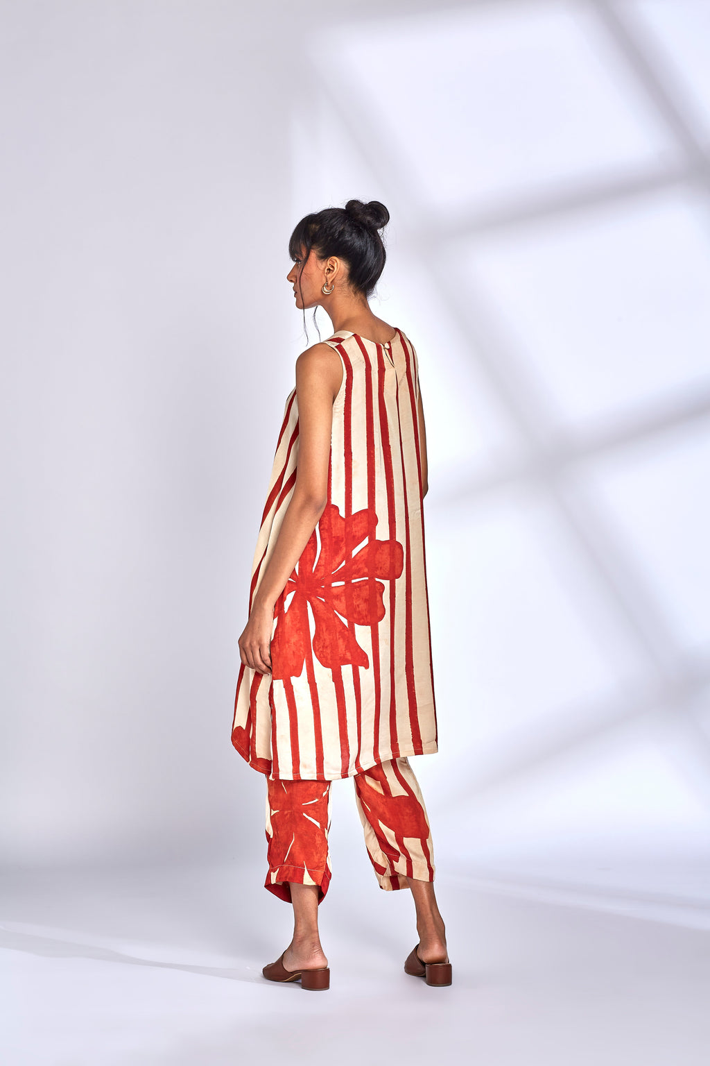 Hand-Painted Silk Kurta Set at Kamakhyaa by Hasttvam. This item is Floral, Fusion Wear, Handmade by Artisans, Modal silk, Natural dyes, Relaxed Fit, Respondible production and Vegan, White