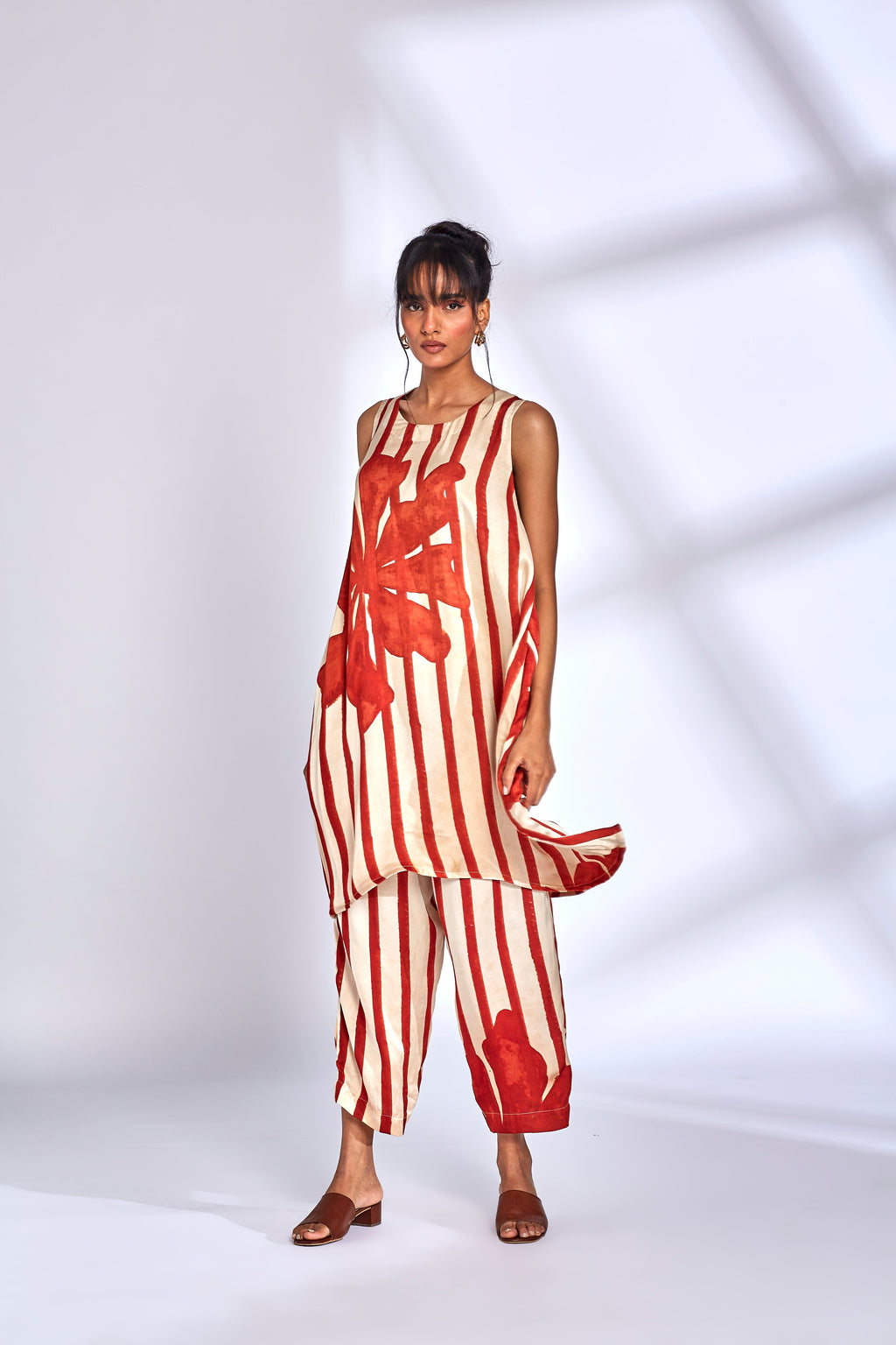 Hand-Painted Silk Kurta Set at Kamakhyaa by Hasttvam. This item is Floral, Fusion Wear, Handmade by Artisans, Modal silk, Natural dyes, Relaxed Fit, Respondible production and Vegan, White