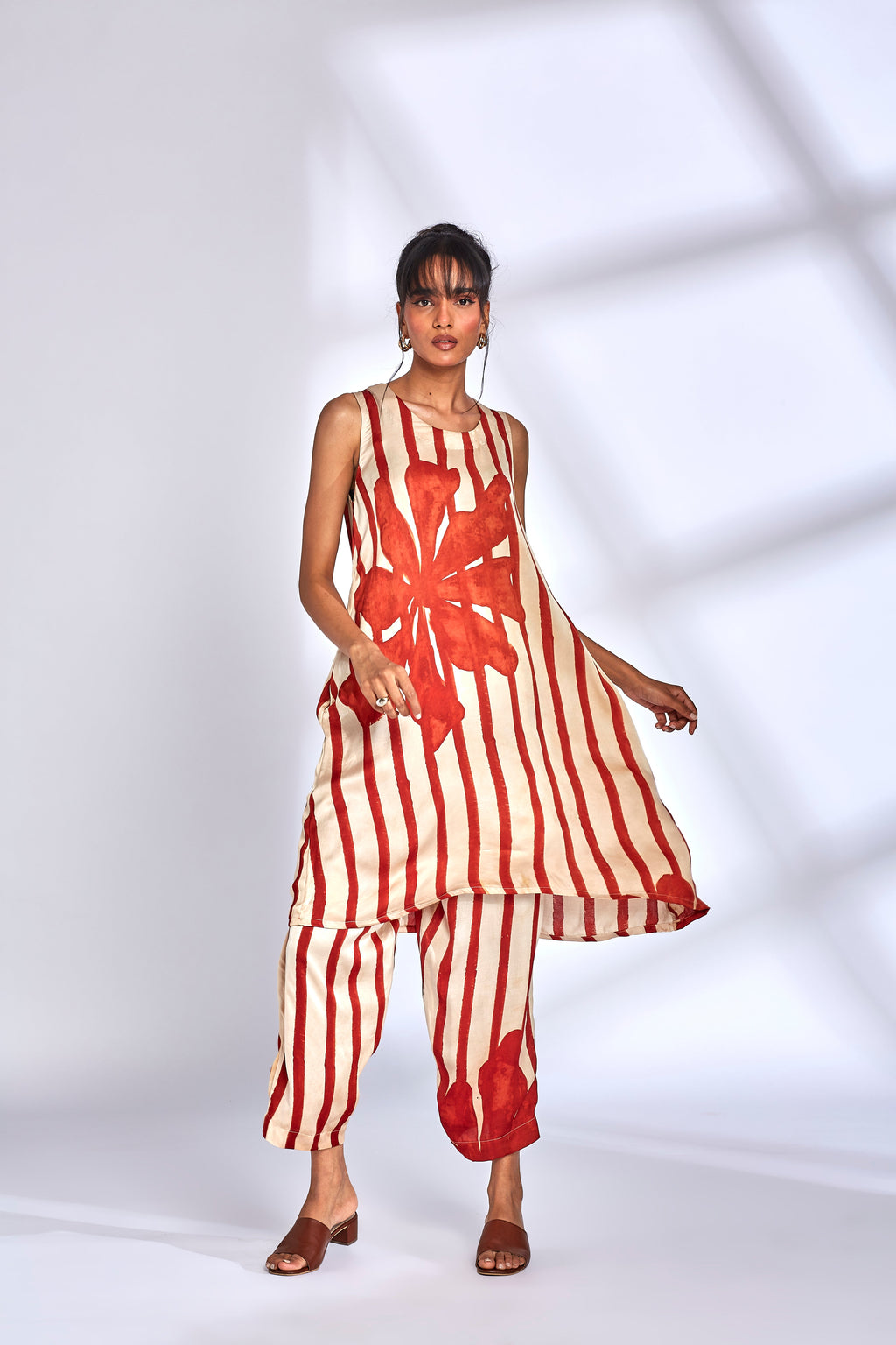 Hand-Painted Silk Kurta Set at Kamakhyaa by Hasttvam. This item is Floral, Fusion Wear, Handmade by Artisans, Modal silk, Natural dyes, Relaxed Fit, Respondible production and Vegan, White