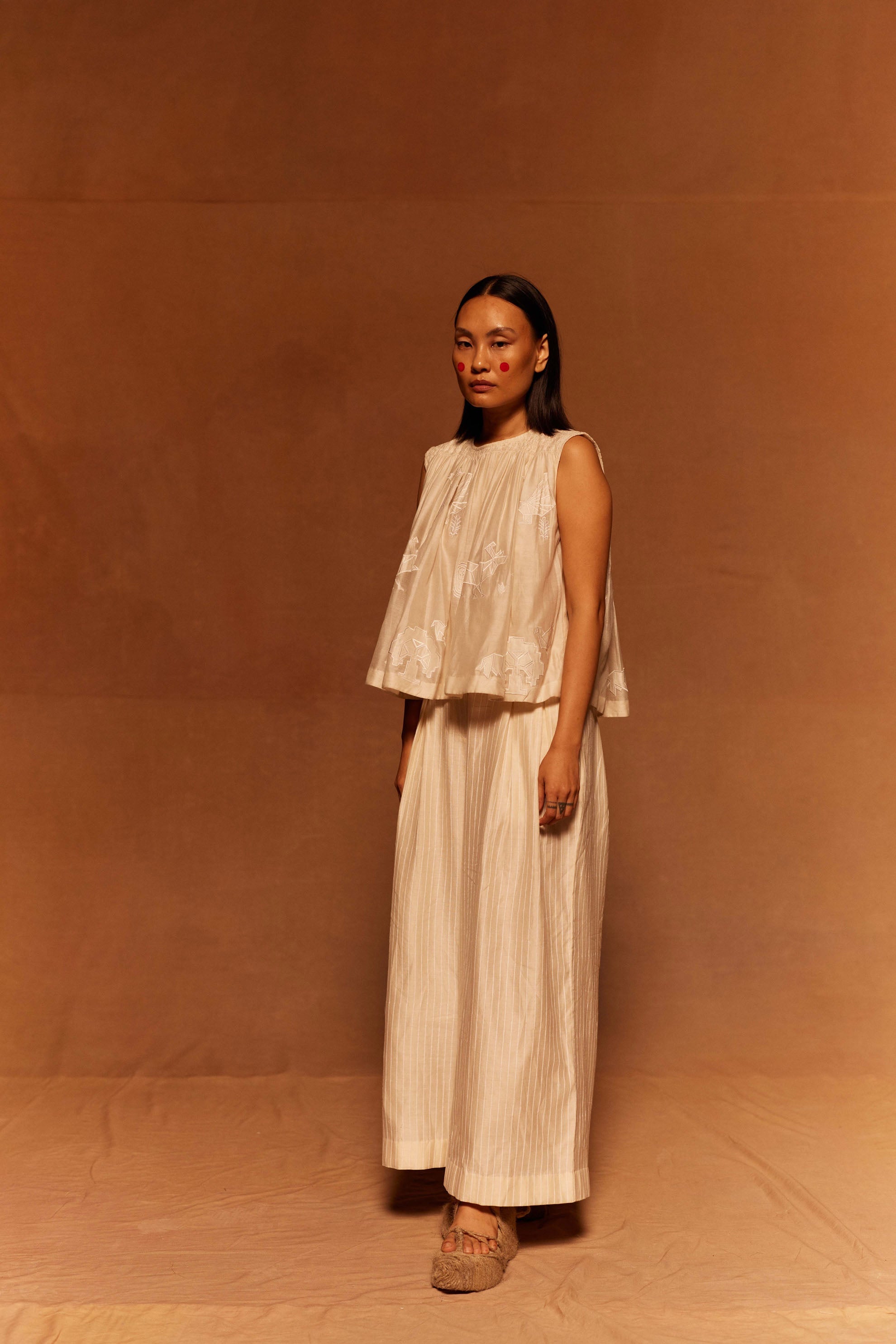 Heion Ruching Top at Kamakhyaa by Ahmev. This item is Applique Work, Cotton Silk, Ivory, Maximum Minimum by Ahmev, Relaxed Fit, Top, Womenswear