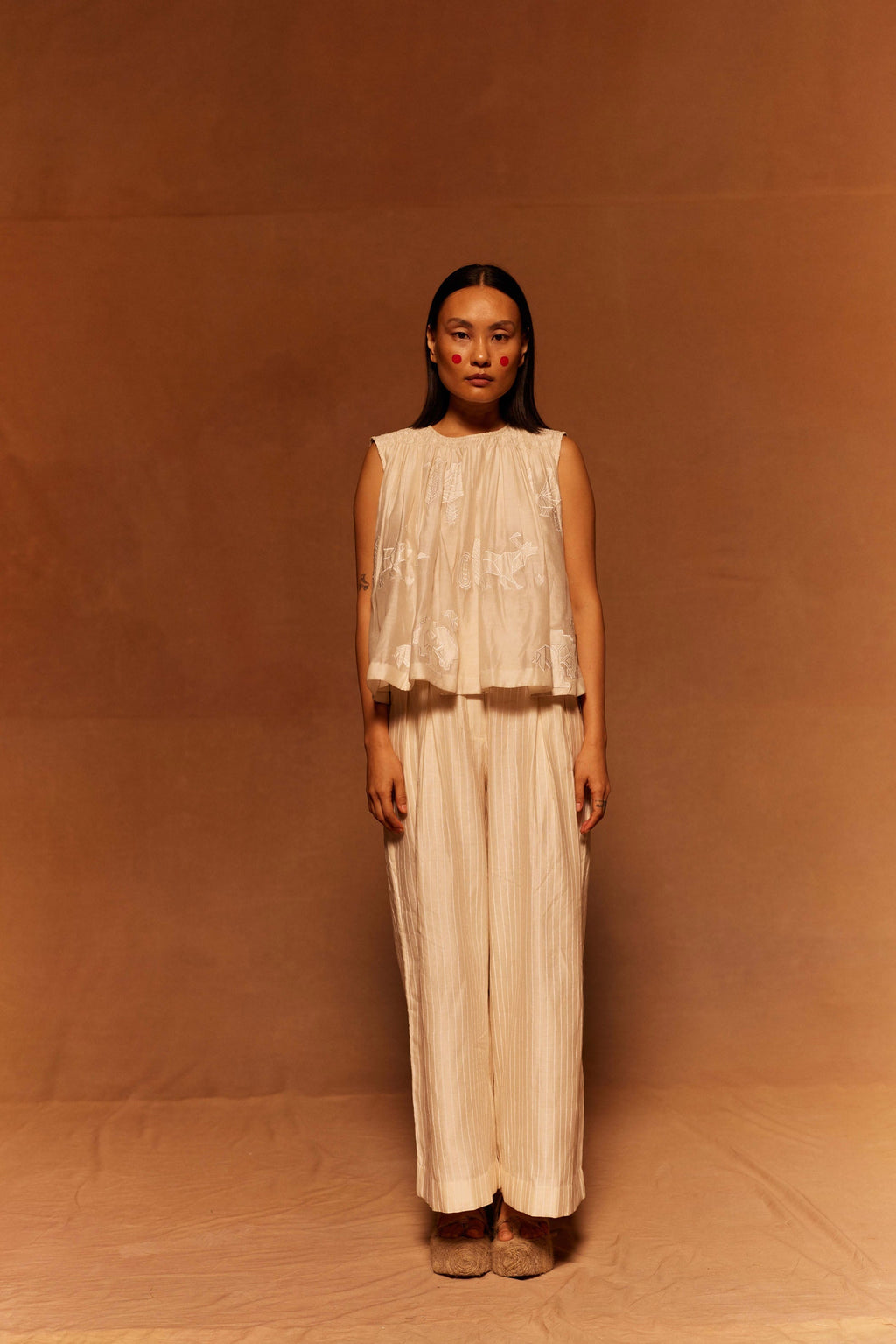 Heion Ruching Top at Kamakhyaa by Ahmev. This item is Applique Work, Cotton Silk, Ivory, Maximum Minimum by Ahmev, Relaxed Fit, Top, Womenswear