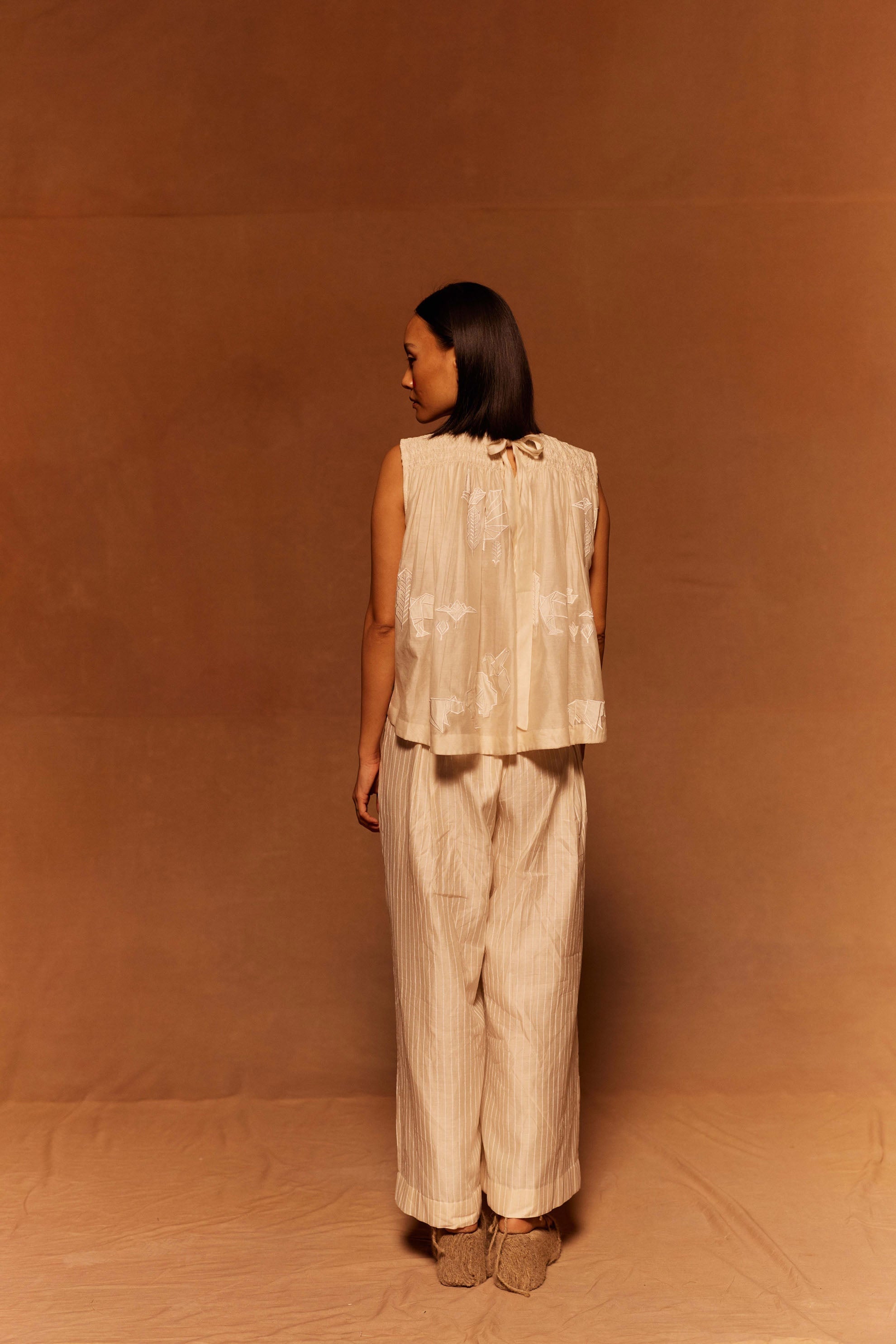 Heion Ruching Top at Kamakhyaa by Ahmev. This item is Applique Work, Cotton Silk, Ivory, Maximum Minimum by Ahmev, Relaxed Fit, Top, Womenswear