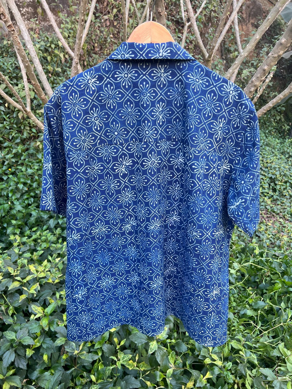 Iris Blue Shirt for Men at Kamakhyaa by Hasttvam. This item is Casual Wear, Console Collection List, Cotton, Floral, Handmade by Artisans, Indigo, missing, Natural dyes, Rang by Hasttvam, Relaxed Fit, Respondible production and Vegan