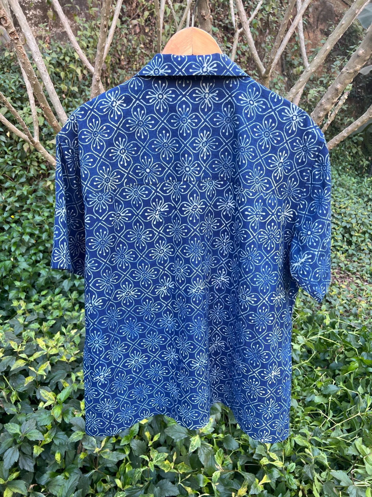 Iris Blue Shirt for Men at Kamakhyaa by Hasttvam. This item is Casual Wear, Console Collection List, Cotton, Floral, Handmade by Artisans, Indigo, missing, Natural dyes, Rang by Hasttvam, Relaxed Fit, Respondible production and Vegan