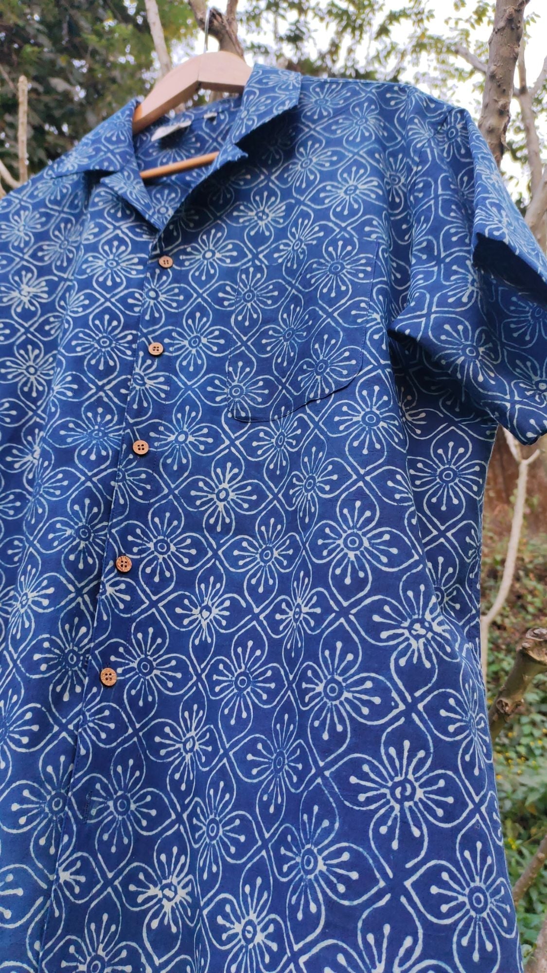 Iris Blue Shirt for Men at Kamakhyaa by Hasttvam. This item is Casual Wear, Console Collection List, Cotton, Floral, Handmade by Artisans, Indigo, missing, Natural dyes, Rang by Hasttvam, Relaxed Fit, Respondible production and Vegan