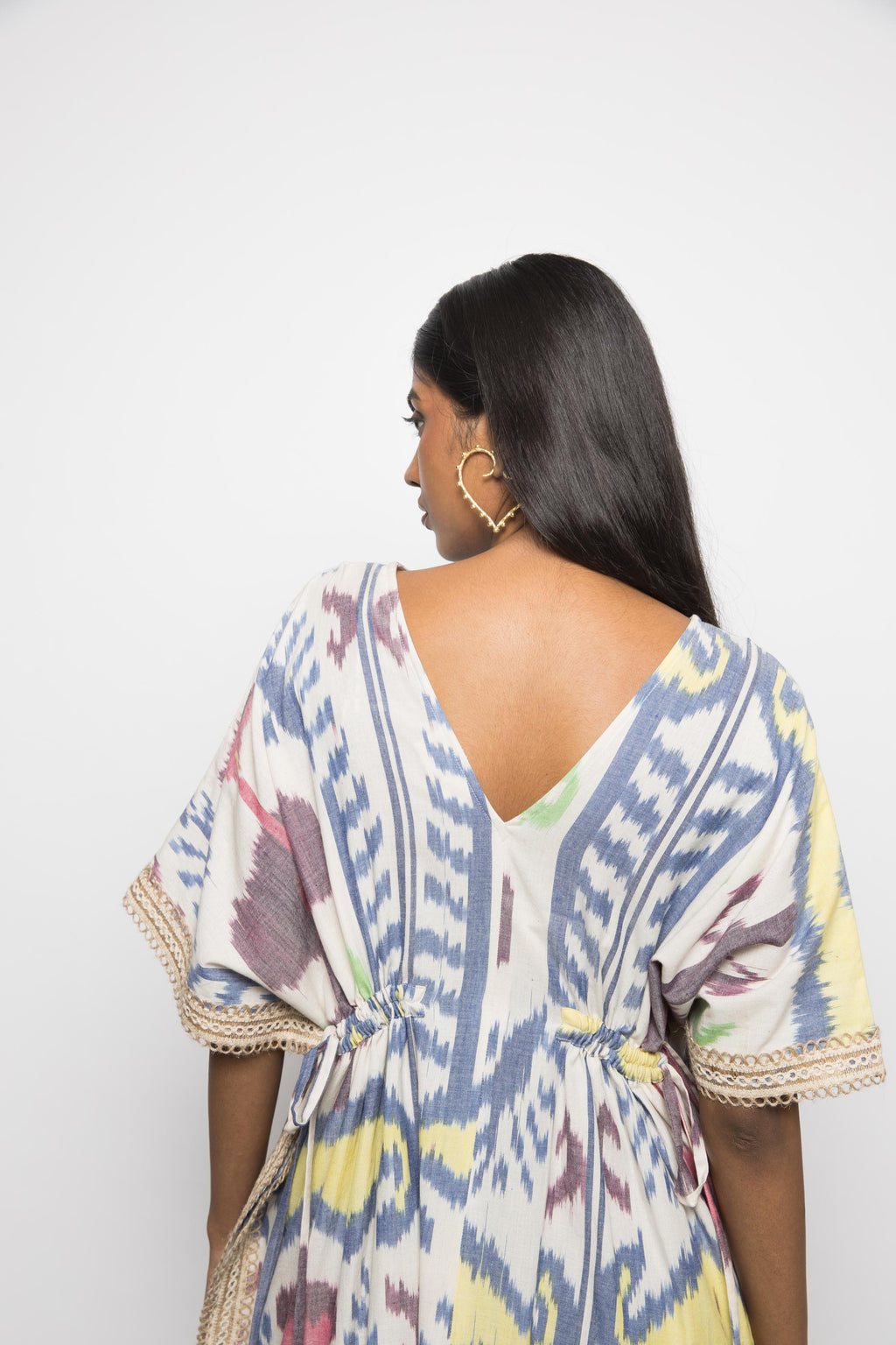Island Breeze Kaftan at kamakhyaa.com by Anushé Pirani. This item is 100% Cotton, Beach Wear, Brunch Wear, Casual Wear, Console Collection List, Cotton, Fresh Ink by Anushe Pirani, Handwoven cotton, Ikat Prints, Multicolor, Regular Fit, Resort Wear, Vacation Wear, Womenswear