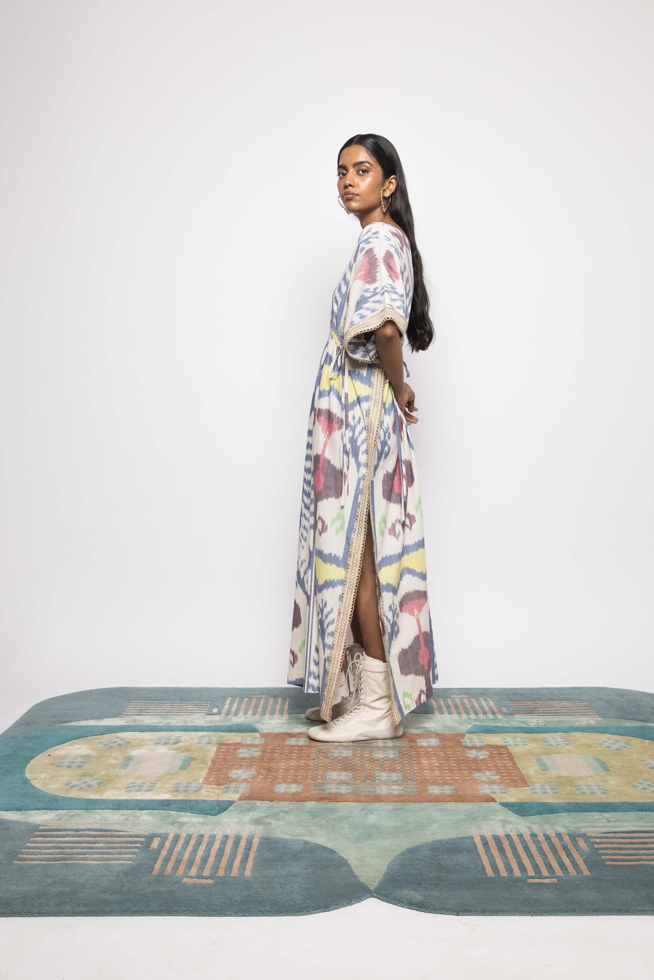 Island Breeze Kaftan at kamakhyaa.com by Anushé Pirani. This item is 100% Cotton, Beach Wear, Brunch Wear, Casual Wear, Console Collection List, Cotton, Fresh Ink by Anushe Pirani, Handwoven cotton, Ikat Prints, Multicolor, Regular Fit, Resort Wear, Vacation Wear, Womenswear