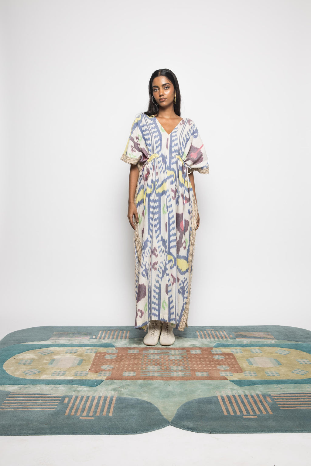 Island Breeze Kaftan at kamakhyaa.com by Anushé Pirani. This item is 100% Cotton, Beach Wear, Brunch Wear, Casual Wear, Console Collection List, Cotton, Fresh Ink by Anushe Pirani, Handwoven cotton, Ikat Prints, Multicolor, Regular Fit, Resort Wear, Vacation Wear, Womenswear