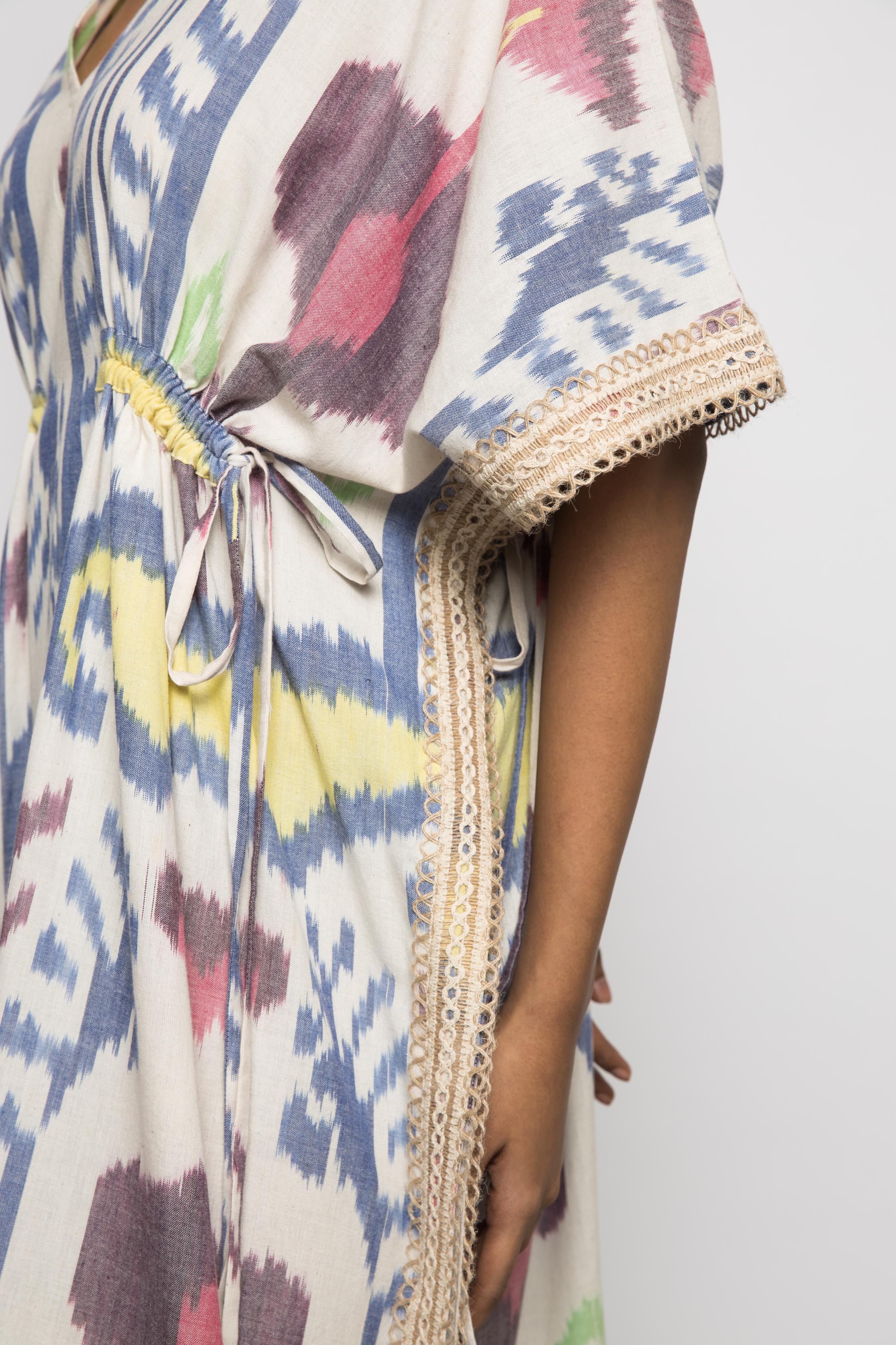 Island Breeze Kaftan at kamakhyaa.com by Anushé Pirani. This item is 100% Cotton, Beach Wear, Brunch Wear, Casual Wear, Console Collection List, Cotton, Fresh Ink by Anushe Pirani, Handwoven cotton, Ikat Prints, Multicolor, Regular Fit, Resort Wear, Vacation Wear, Womenswear