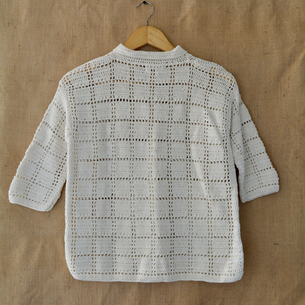 Ivory Grid Crochet Shirt at Kamakhyaa by Ikriit'm. This item is Bloom by Ikriit'm, Casual Wear, Cotton, Crochet, Crochet Apparel, Relaxed Fit, Under $100, White, Womenswear