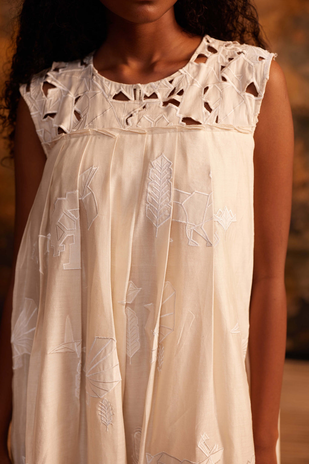 Kujaku Knife Pleat Dress at Kamakhyaa by Ahmev. This item is Cotton Silk, Dress, Embroidered, Ivory, Maximum Minimum by Ahmev, Relaxed Fit, Womenswear