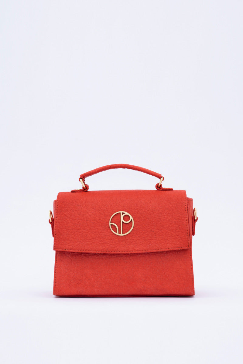 London LHR - Piñatex® Saddle Bag - Cherry at Kamakhyaa by 1 People. This item is 