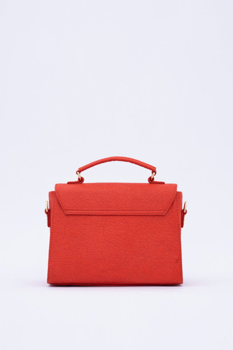 London LHR - Piñatex® Saddle Bag - Cherry at Kamakhyaa by 1 People. This item is 