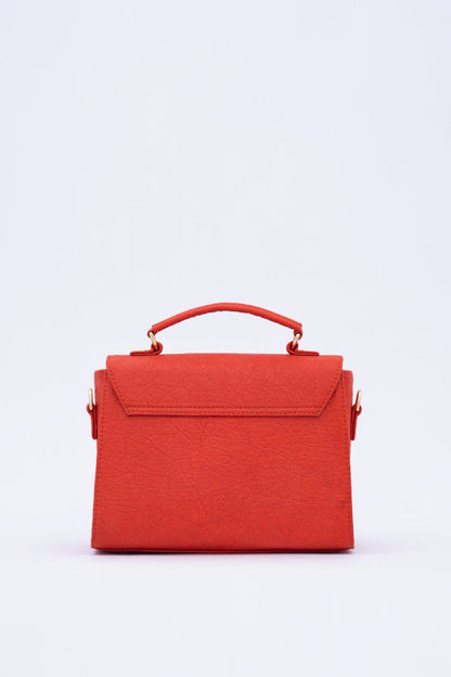 London LHR - Piñatex® Saddle Bag - Cherry at Kamakhyaa by 1 People. This item is 