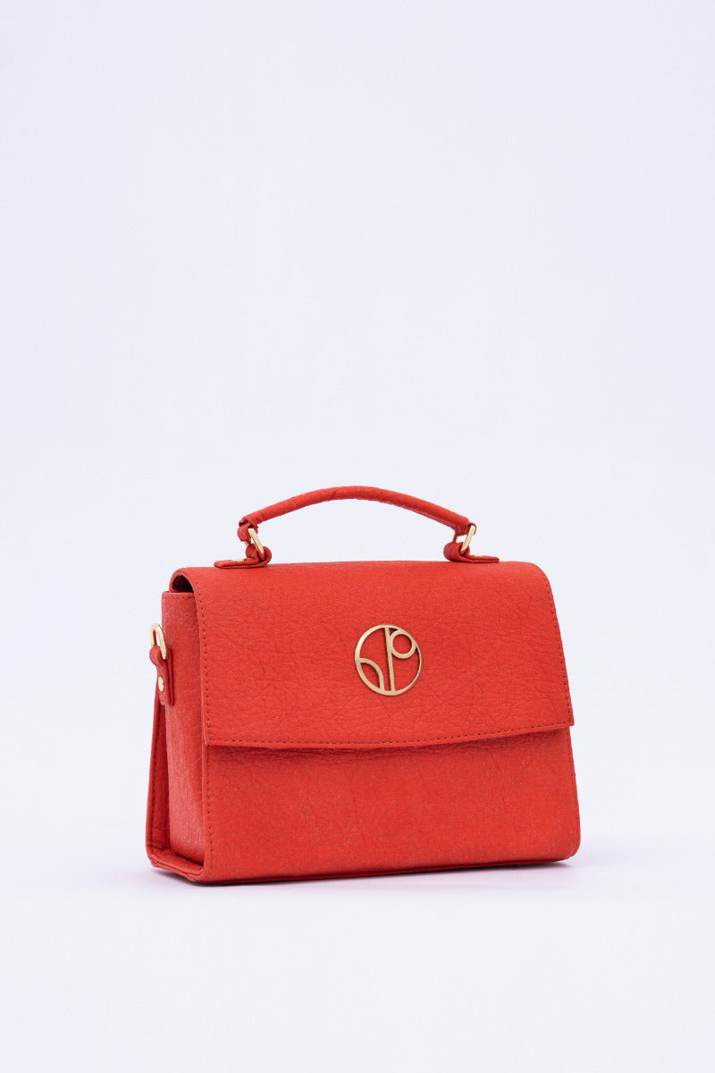 London LHR - Piñatex® Saddle Bag - Cherry at Kamakhyaa by 1 People. This item is 