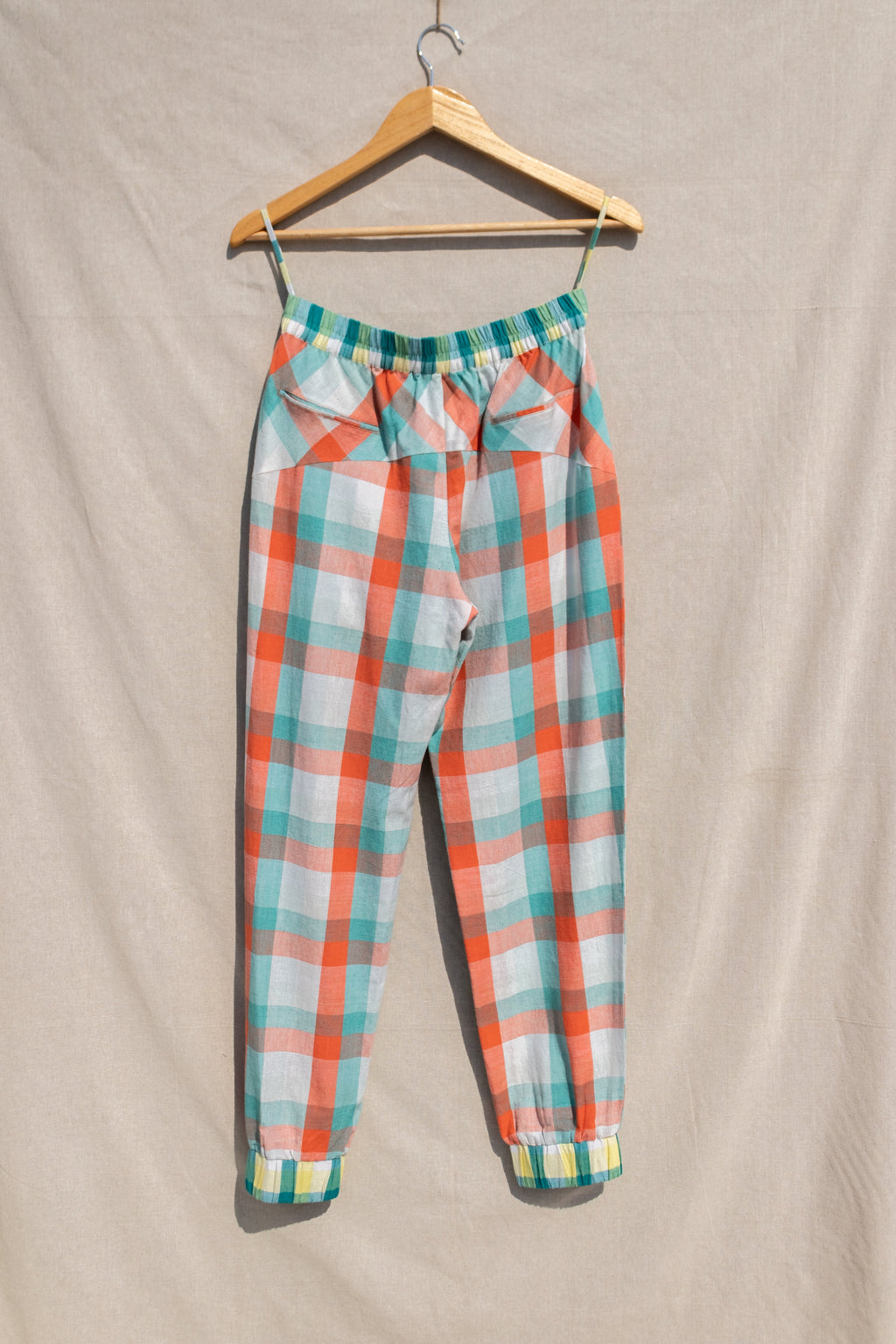 Multicolor Jogger Pants at kamakhyaa.com by Anushé Pirani. This item is Anushe Pirani Sale, Casual Wear, Checks, Fitted At Waist, Handwoven Cotton, Joggers, July Sale, July Sale 2023, Multicolor, Natural, Of Myriad Minds by Anushe Pirani, Office Wear, Playful Office Wear, Womenswear
