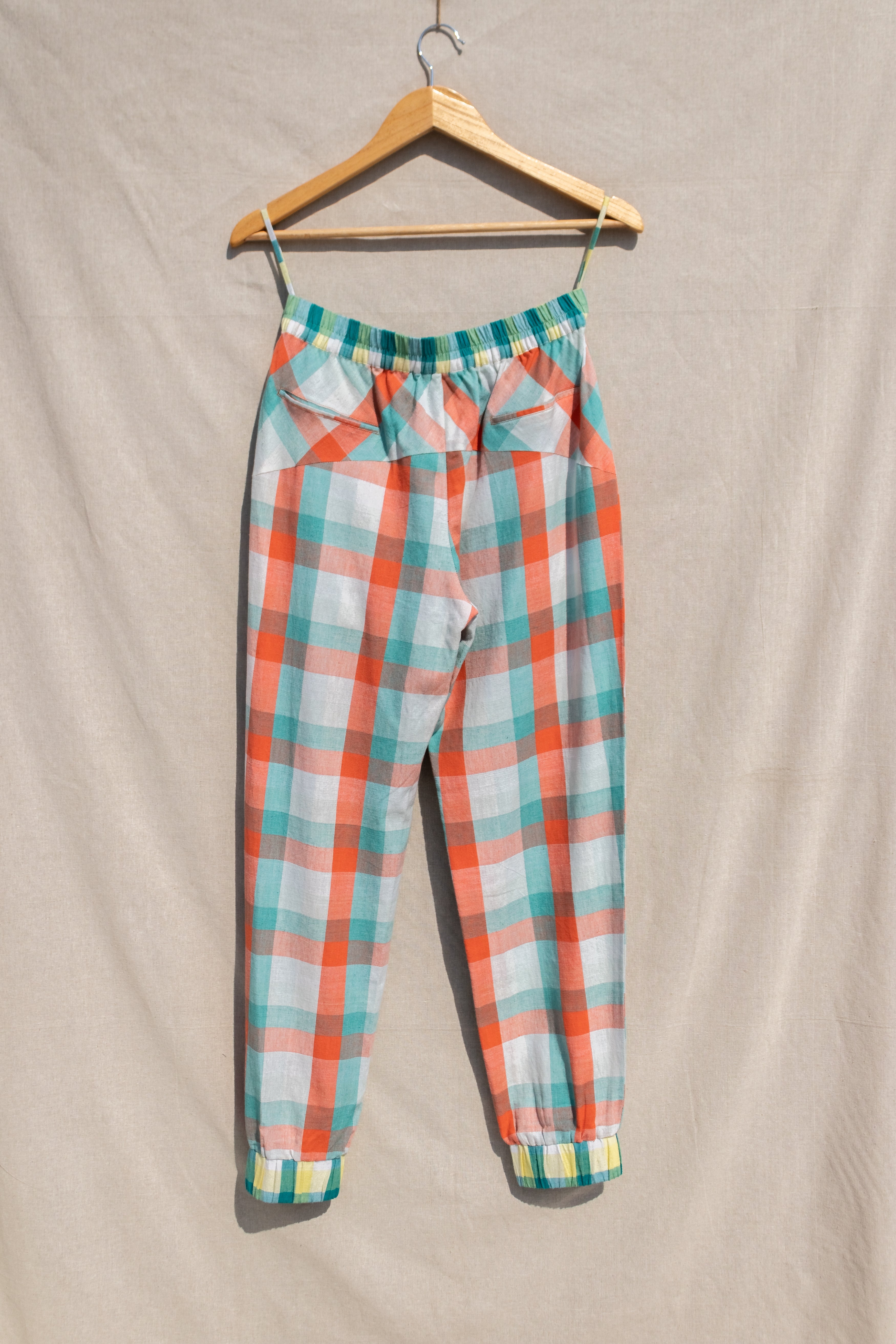 Multicolor Jogger Pants at kamakhyaa.com by Anushé Pirani. This item is Anushe Pirani Sale, Casual Wear, Checks, Fitted At Waist, Handwoven Cotton, Joggers, July Sale, July Sale 2023, Multicolor, Natural, Of Myriad Minds by Anushe Pirani, Office Wear, Playful Office Wear, Womenswear