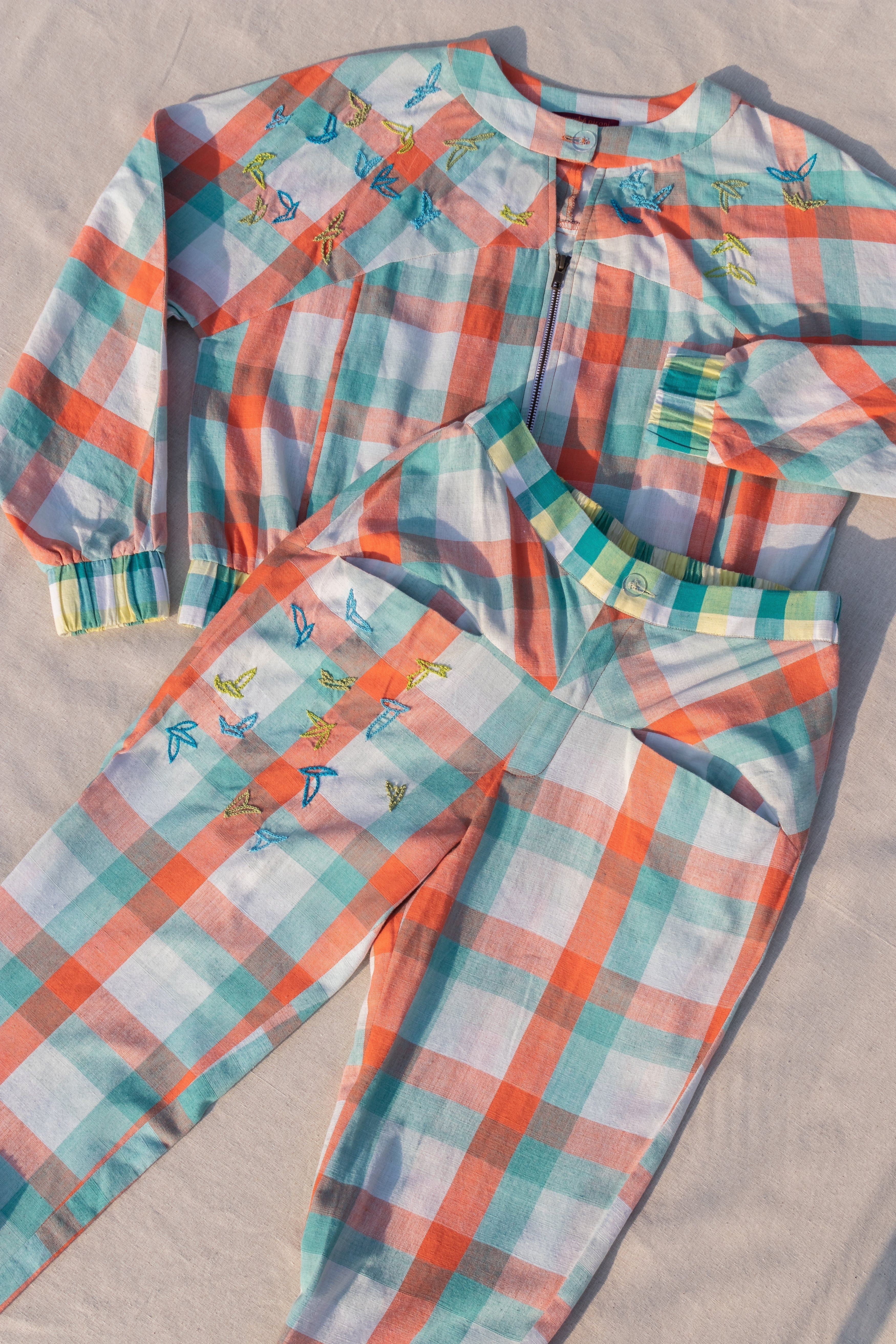 Multicolor Jogger Pants at kamakhyaa.com by Anushé Pirani. This item is Anushe Pirani Sale, Casual Wear, Checks, Fitted At Waist, Handwoven Cotton, Joggers, July Sale, July Sale 2023, Multicolor, Natural, Of Myriad Minds by Anushe Pirani, Office Wear, Playful Office Wear, Womenswear