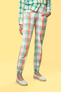 Multicolor Jogger Pants at kamakhyaa.com by Anushé Pirani. This item is Anushe Pirani Sale, Casual Wear, Checks, Fitted At Waist, Handwoven Cotton, Joggers, July Sale, July Sale 2023, Multicolor, Natural, Of Myriad Minds by Anushe Pirani, Office Wear, Playful Office Wear, Womenswear