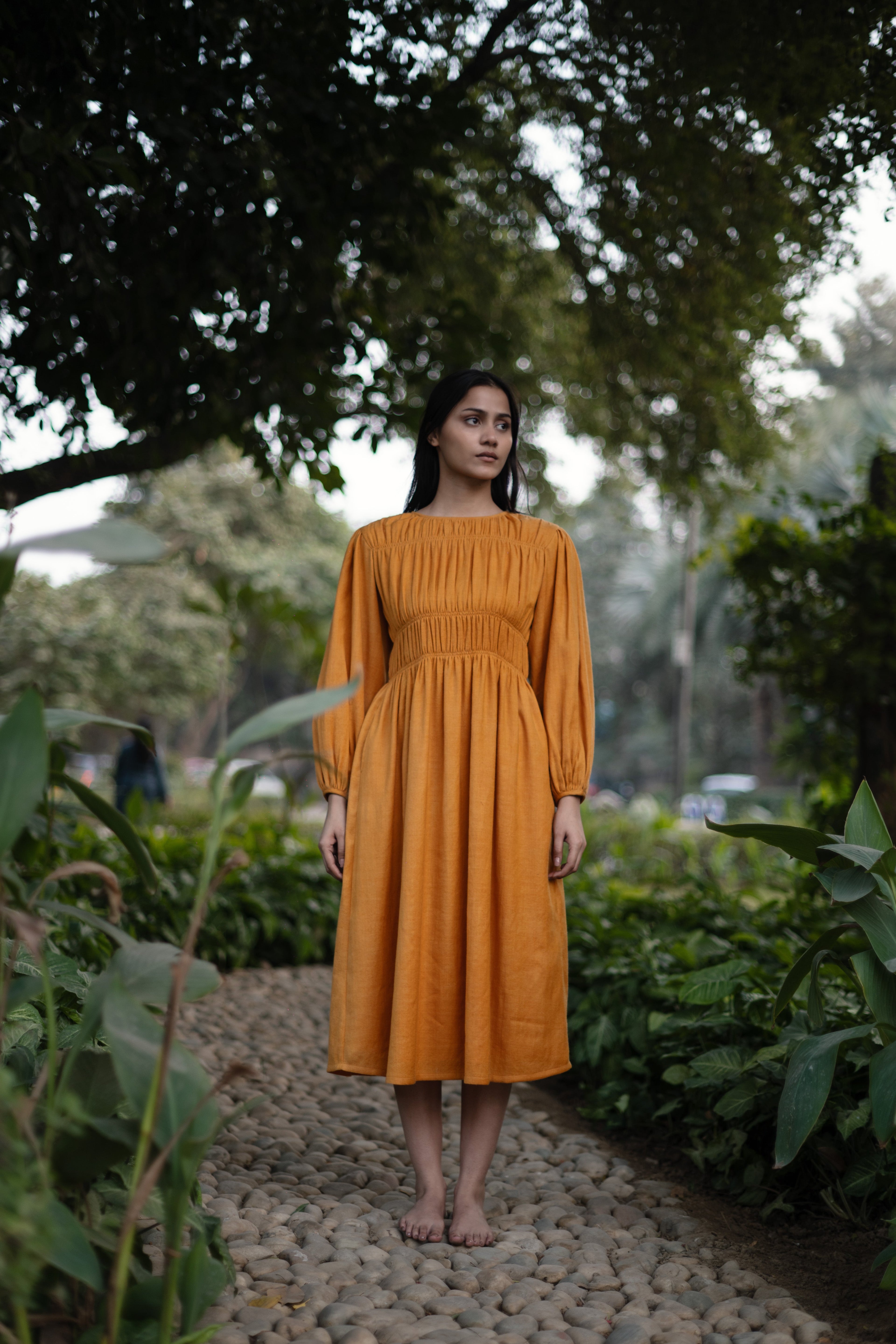 Mustard Yellow Merino Wool Sunflower Dress at Kamakhyaa by Raas. This item is Merino Wool, Midi Dresses, Mustard, Regular Fit, Uru by Raas, Winter Wear, Woven