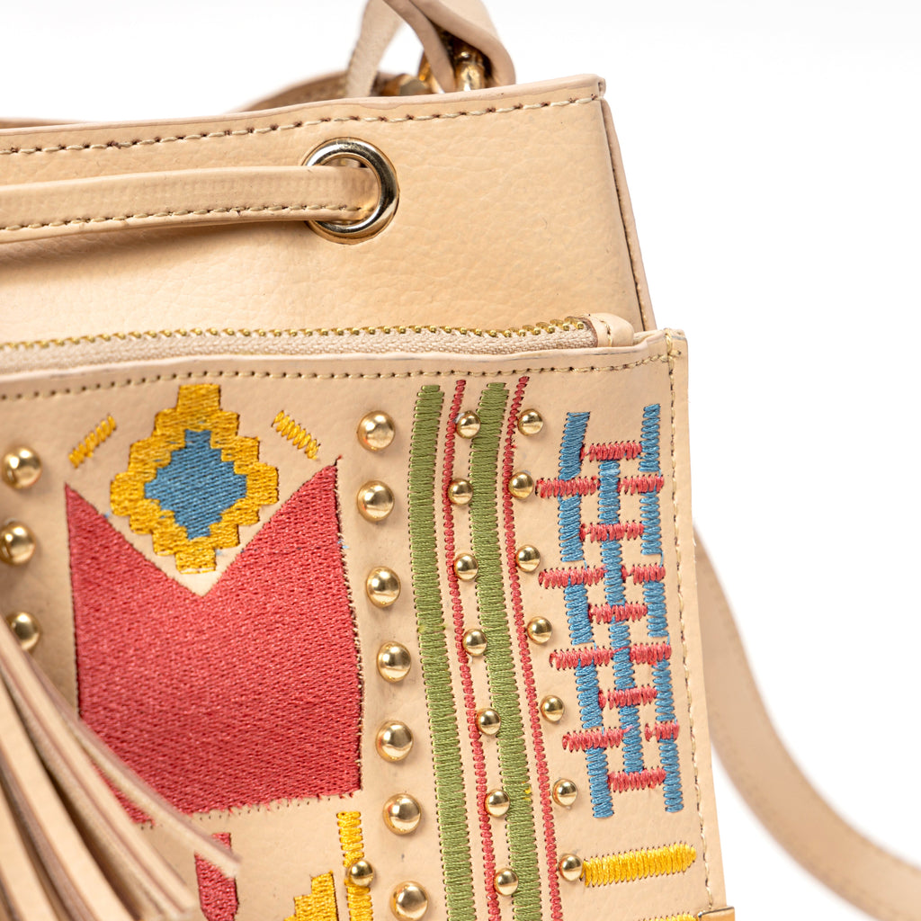 Nora Vegan Leather Embroidered Sling Bag - Almond at Kamakhyaa by Green Hermitage. This item is A Walk in the Forest by Green Hermitage, Banana Leather, Sling Bags, Tan, Under $50